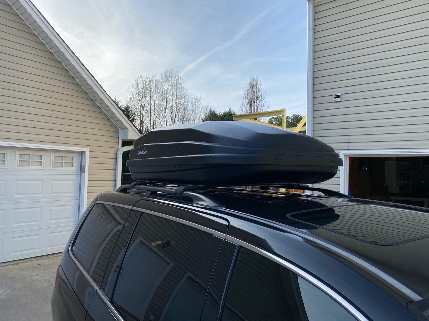 SportRack Vista XL roof cargo box loaded for a family camping trip