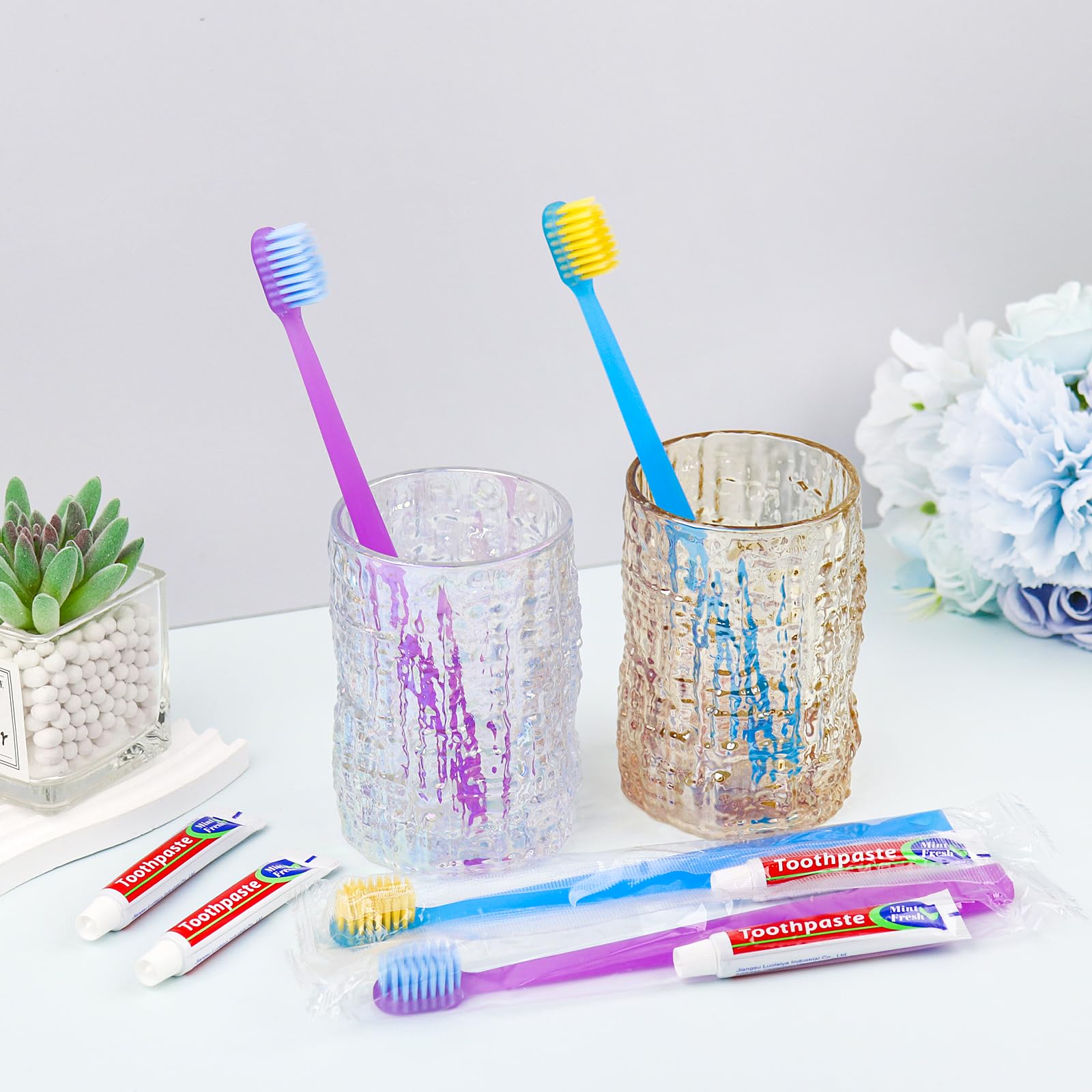 120 cepillos de dientes desechables con pasta de dientes envueltos