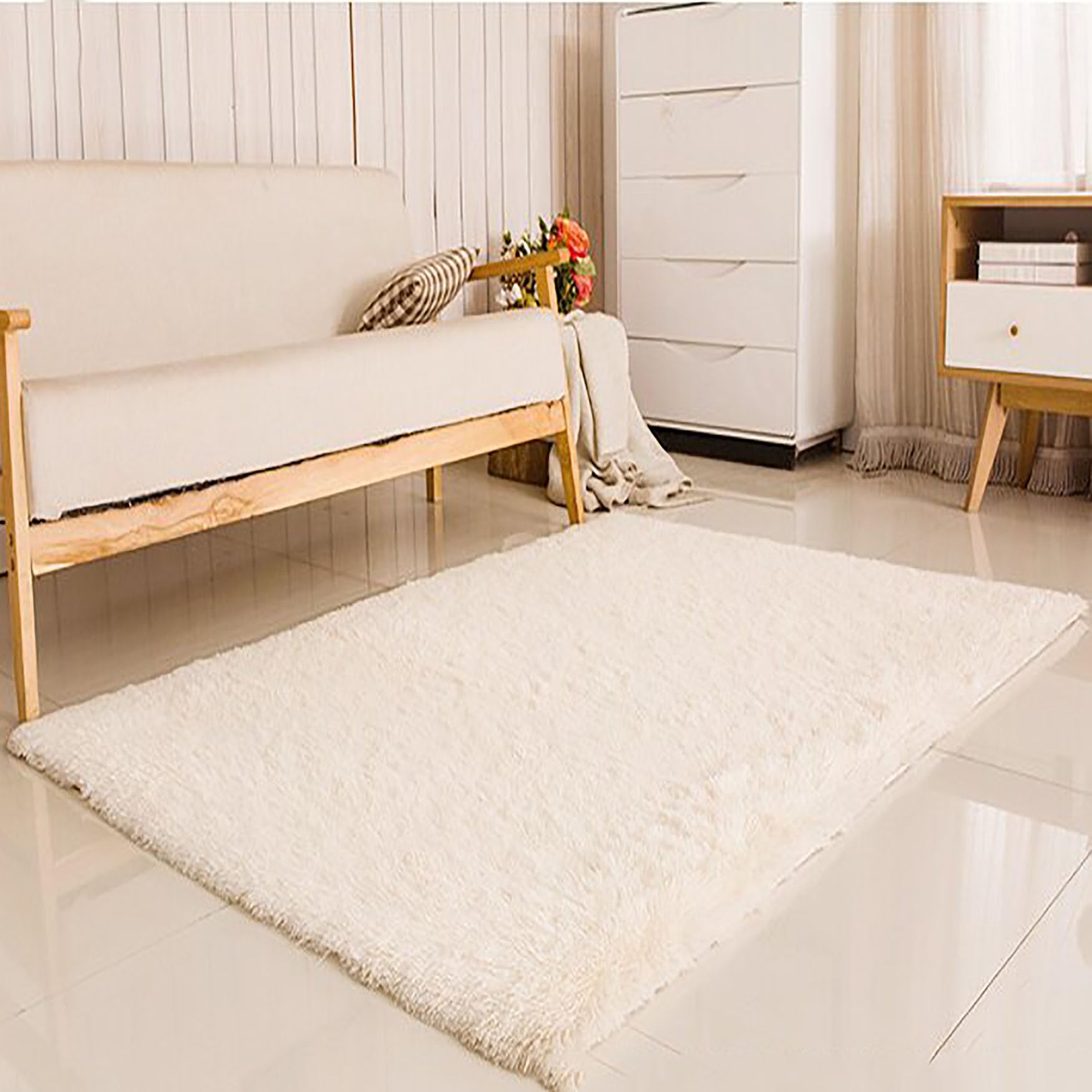 Tapis antidérapant blanc lavable pour sécuriser le salon et les enfants