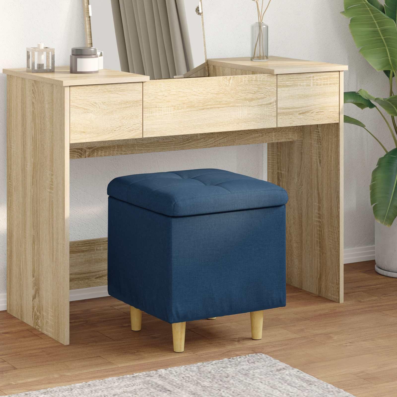 Ottoman siege bleu avec rangement cache et coussin capitonne confortable