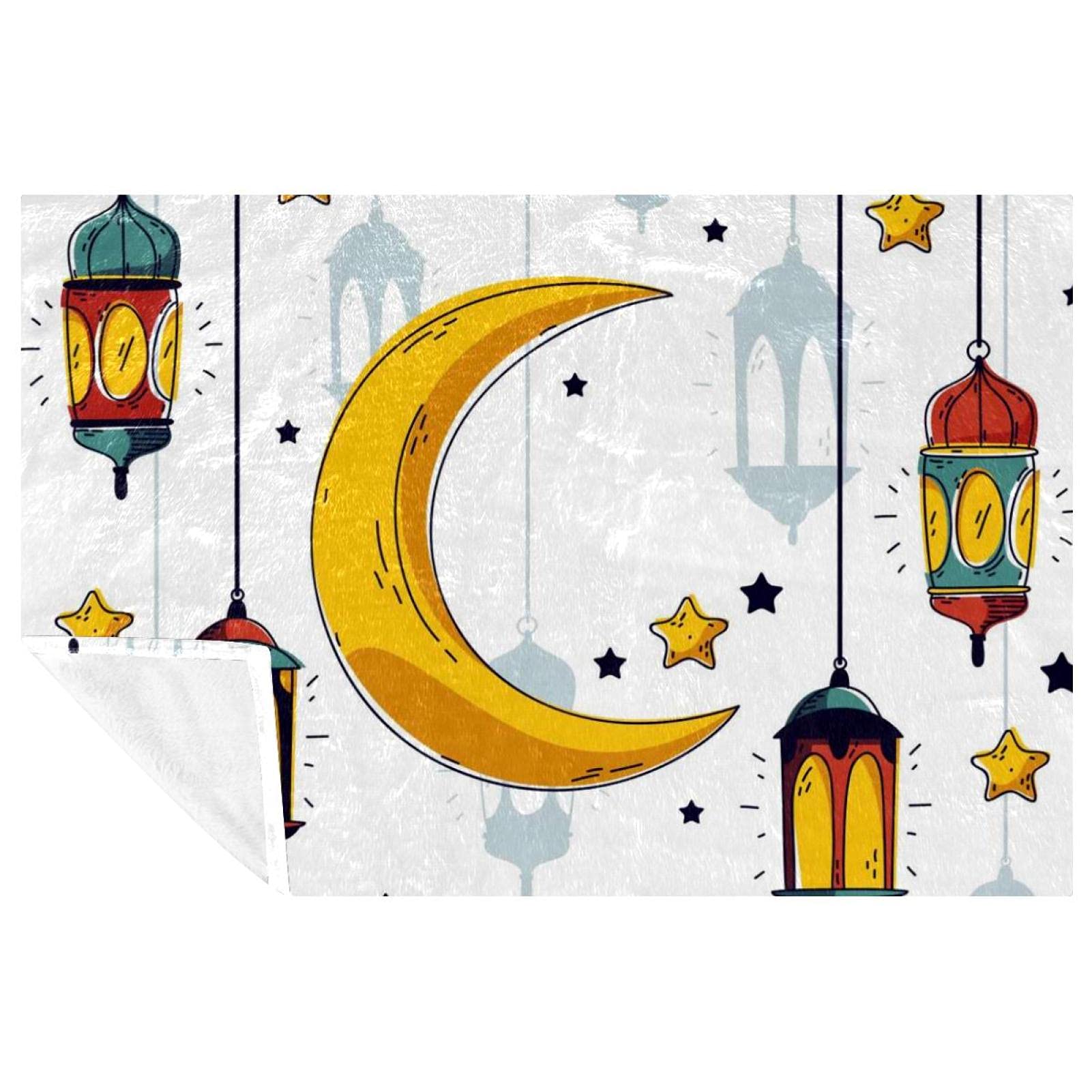 Couverture lune et étoiles douce pour des moments chaleureux en famille sur le canapé ou au lit