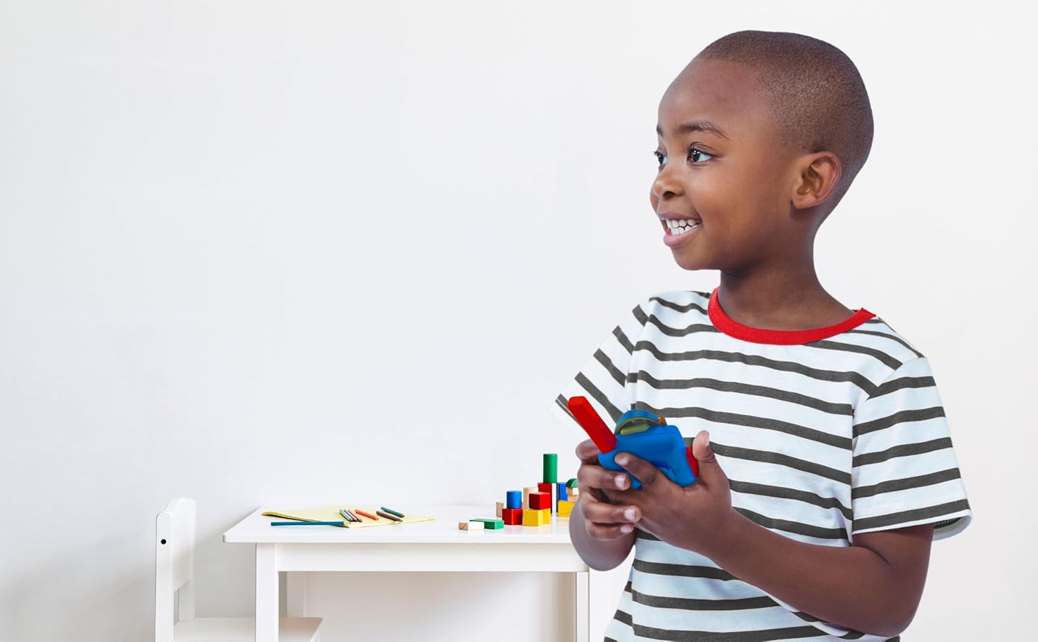 Child holding an eKids Paw Patrol Walkie Talkie