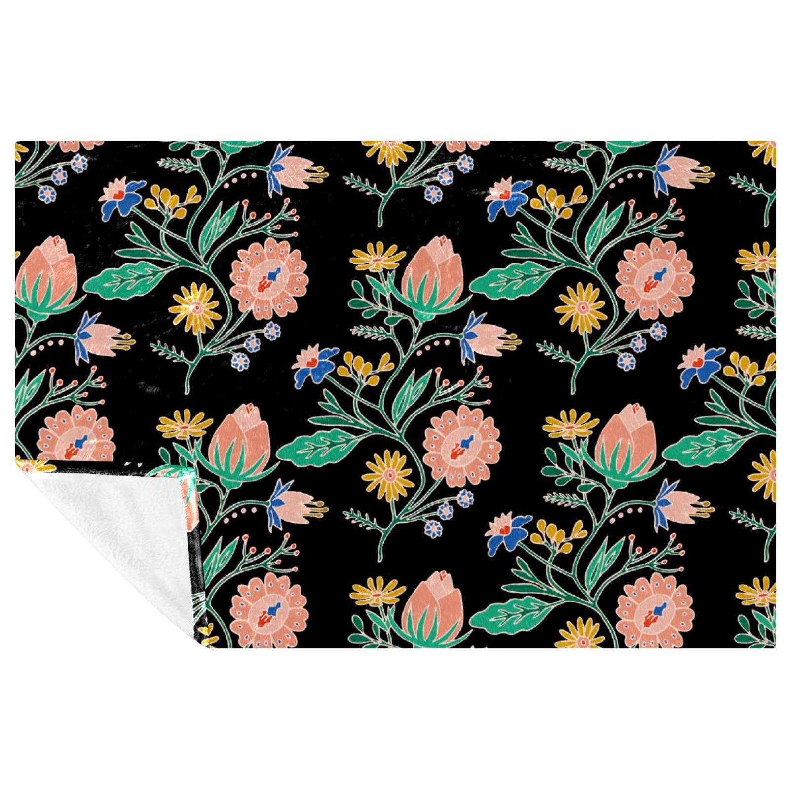 Couverture chaude ethnique noire : le plaid brodé isolant et doux