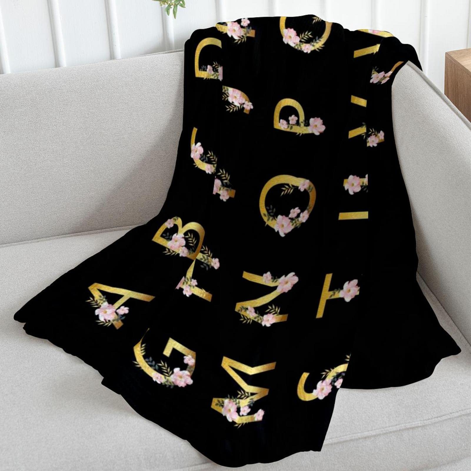 Coperta in pile con fiori dell'alfabeto per divano, divano o letto
