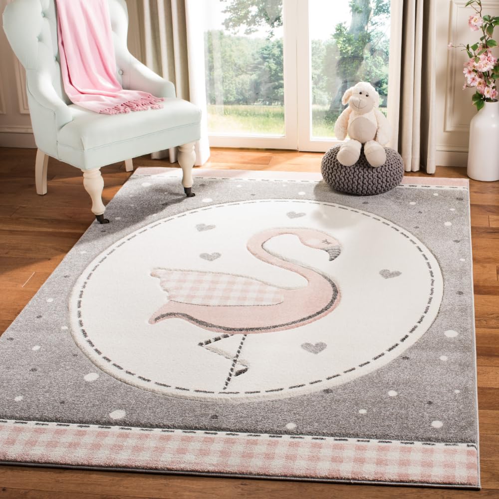 SAFAVIEH Carousel Kids Collection Area Rug - 6'7" x 9', Pink & Ivory, Non-Shedding & Easy Care, Ideal for High Traffic Areas for Boys & Girls in