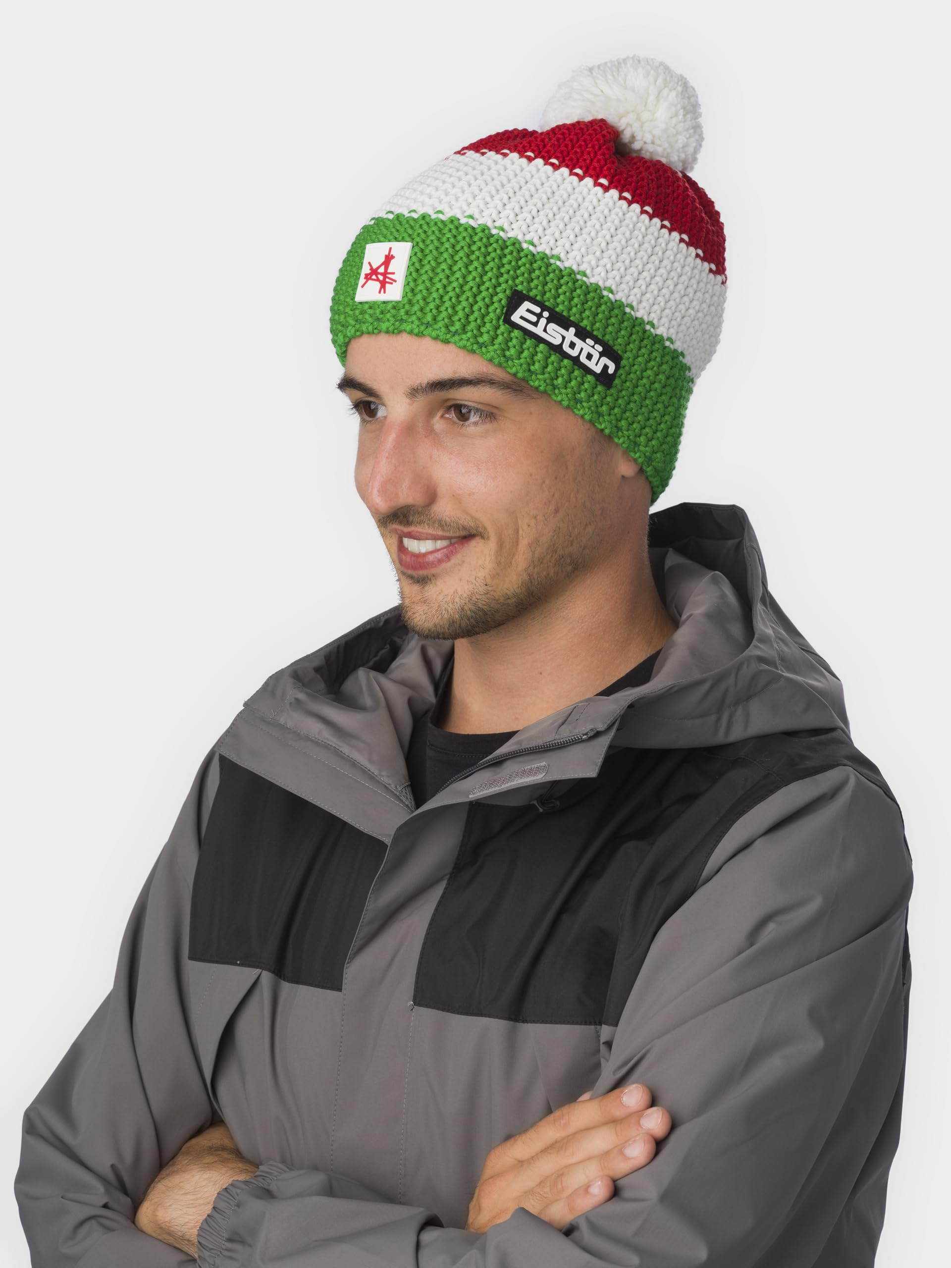 Eisbär Mütze Herren & Damen Star Pompon Ski Austria - Merino Wintermütze Unisex mit Fleece schützt vor Kälte und Wind - Bommelmütze atmungsaktiv elastisch Haube aus Österreich