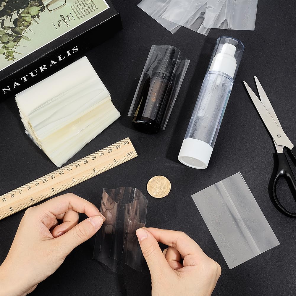 BENECREAT 600Pcs Heat Shrink Wrap Bands, 3.6x2.4 Inch Clear Heat Shrink Bottle Seals for Essential Oil Bottle, Lip Balm Tube, Glass Dropper Spray Bottle