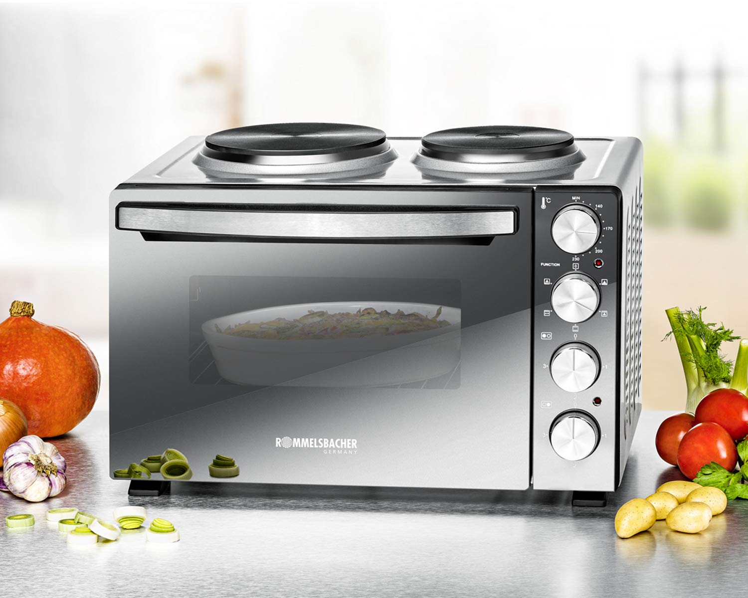 ROMMELSBACHER KLEINKÜCHE KM 3300-2 Gussheizplatten, 30 Liter Backraum, Oberhitze, Unterhitze, Umluft, Drehspieß, 3 Einschubebenen, Doppelverglasung, Spiegelglas-Front, 3250 Watt, silber/schwarz