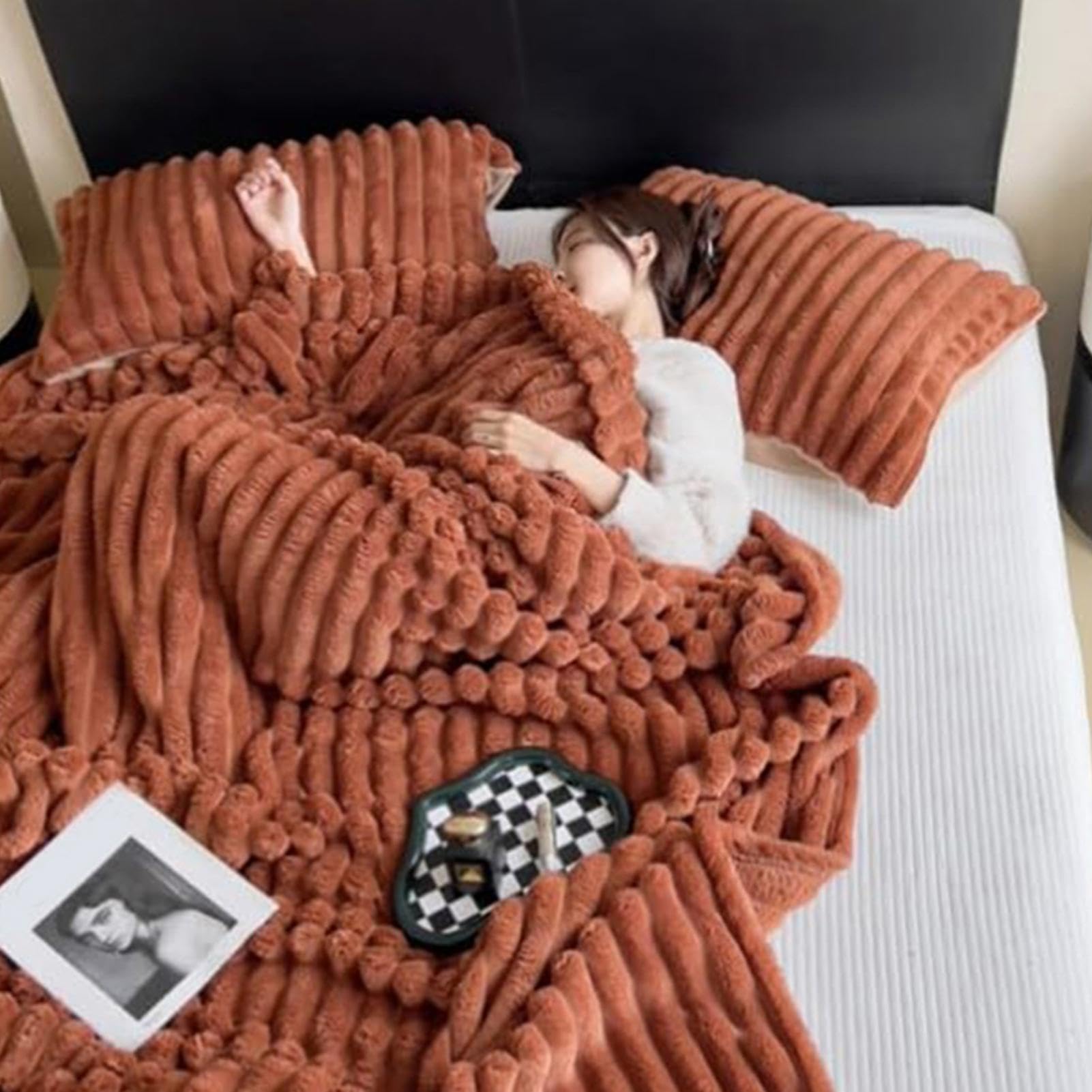 Couverture en fourrure de lapin synthétique pour oublier le froid sur le canapé