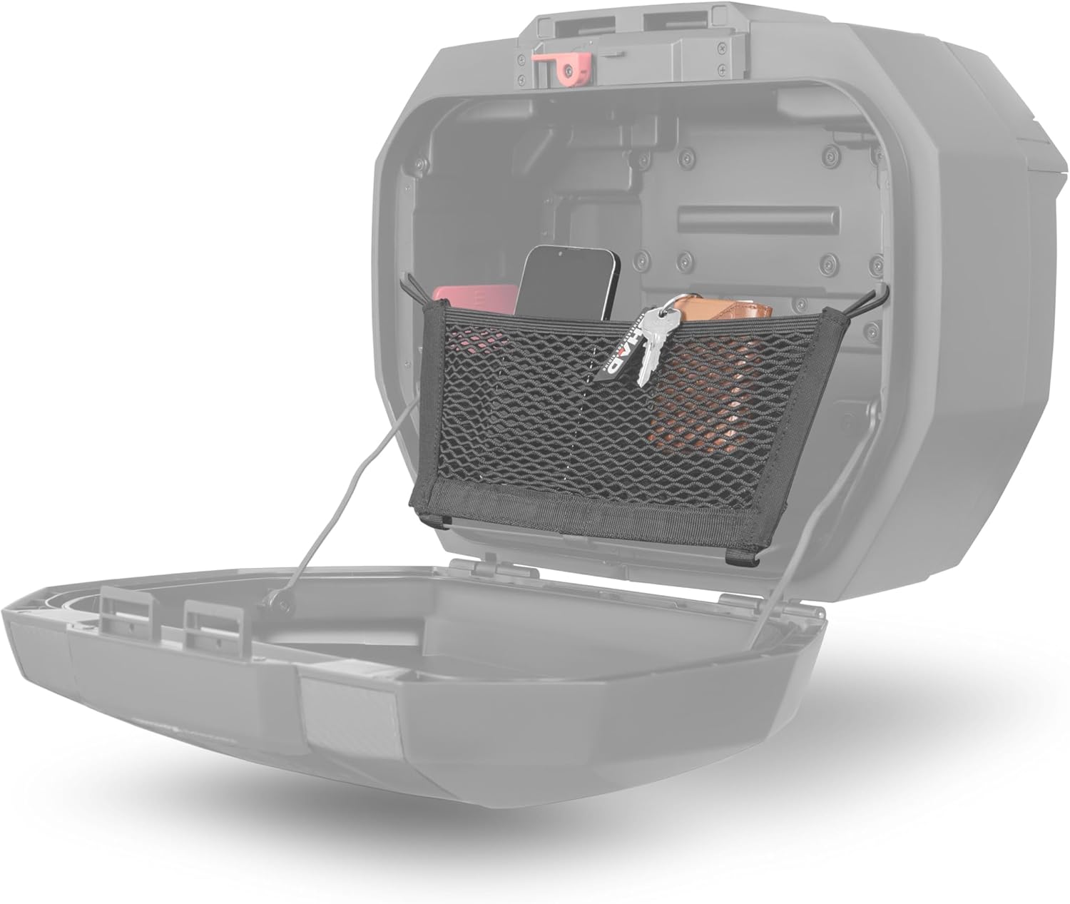 Open SHAD SH38X side case showing an inner mesh net pocket with small items