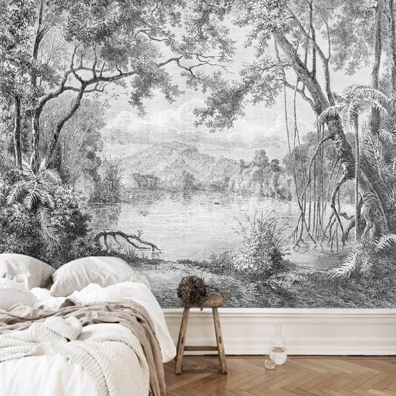 Papier peint forêt noire et blanche pour créer un salon style jungle épurée