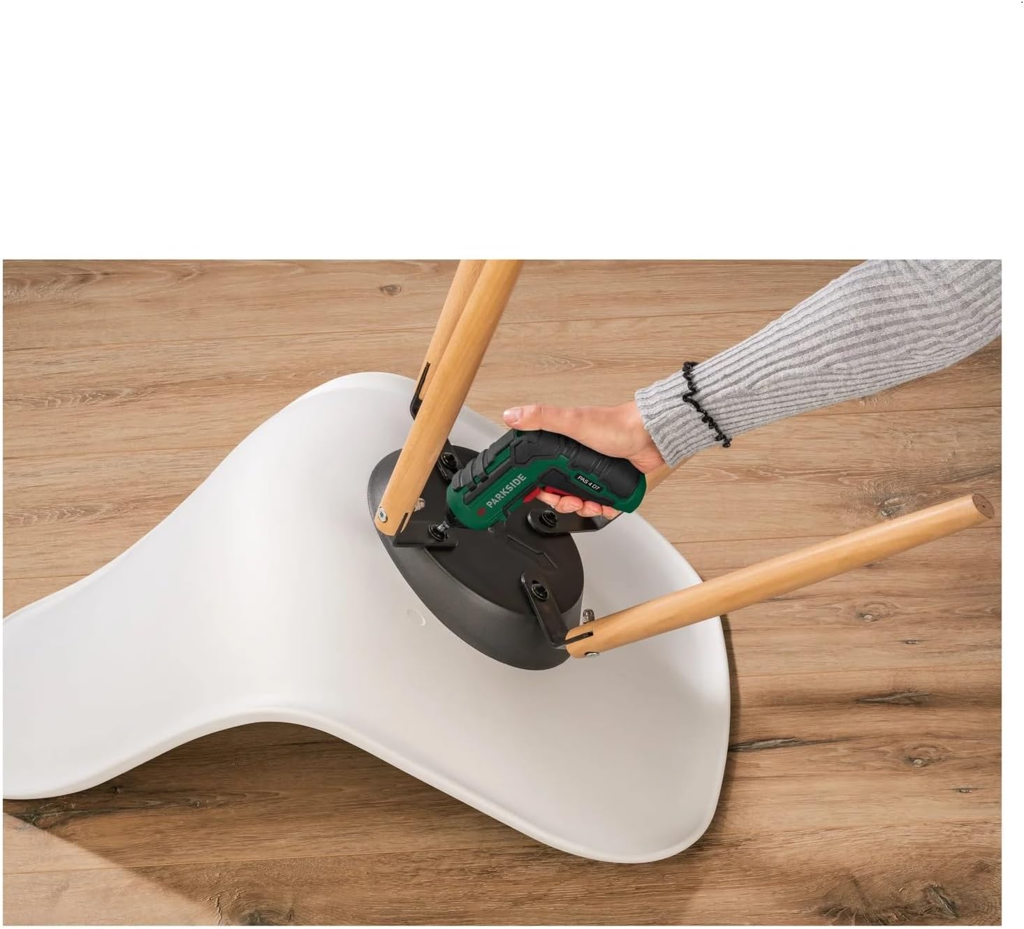Person using Parkside 4V Cordless Screwdriver to tighten screws on a chair