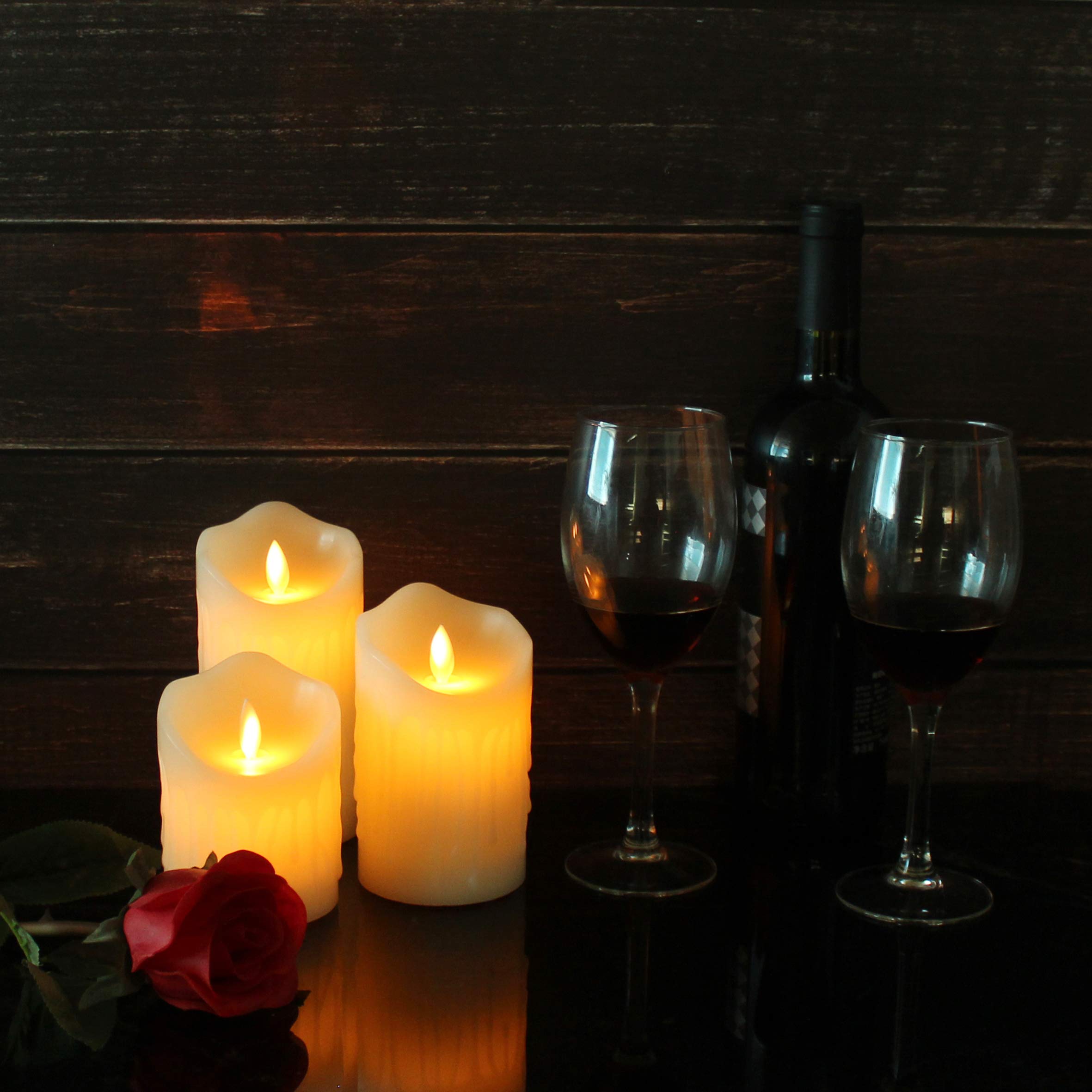 CVHOMEDECO. Bougies sans flamme Electronique Batterie rechargeable Extra Brillant Ivory Dripping Real Wax Pillars LED Flickering Pillar Candle with 10-Key Remote Control, Set of 3