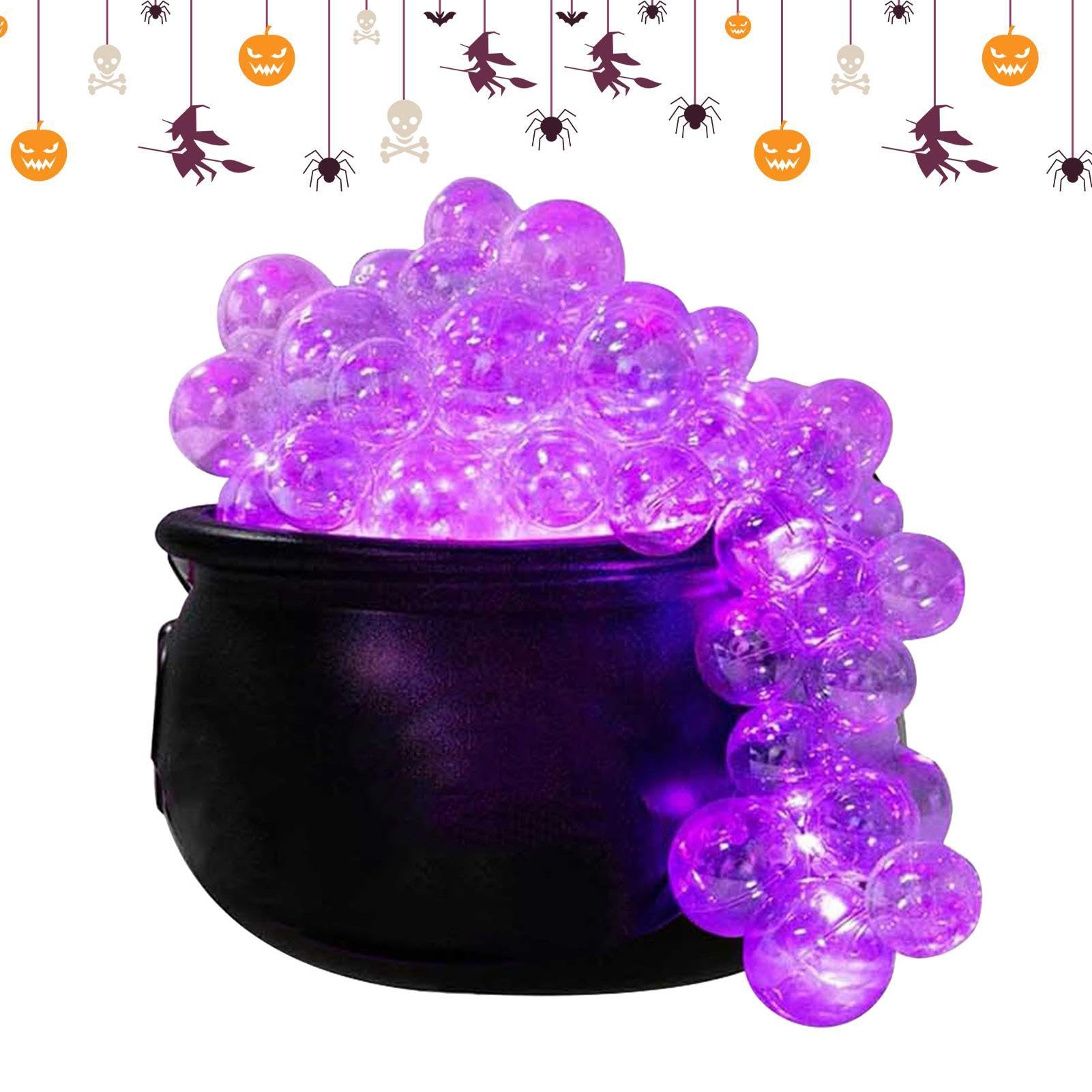 Calderos de Halloween con luz burbujeante y efectos visuales de pociones