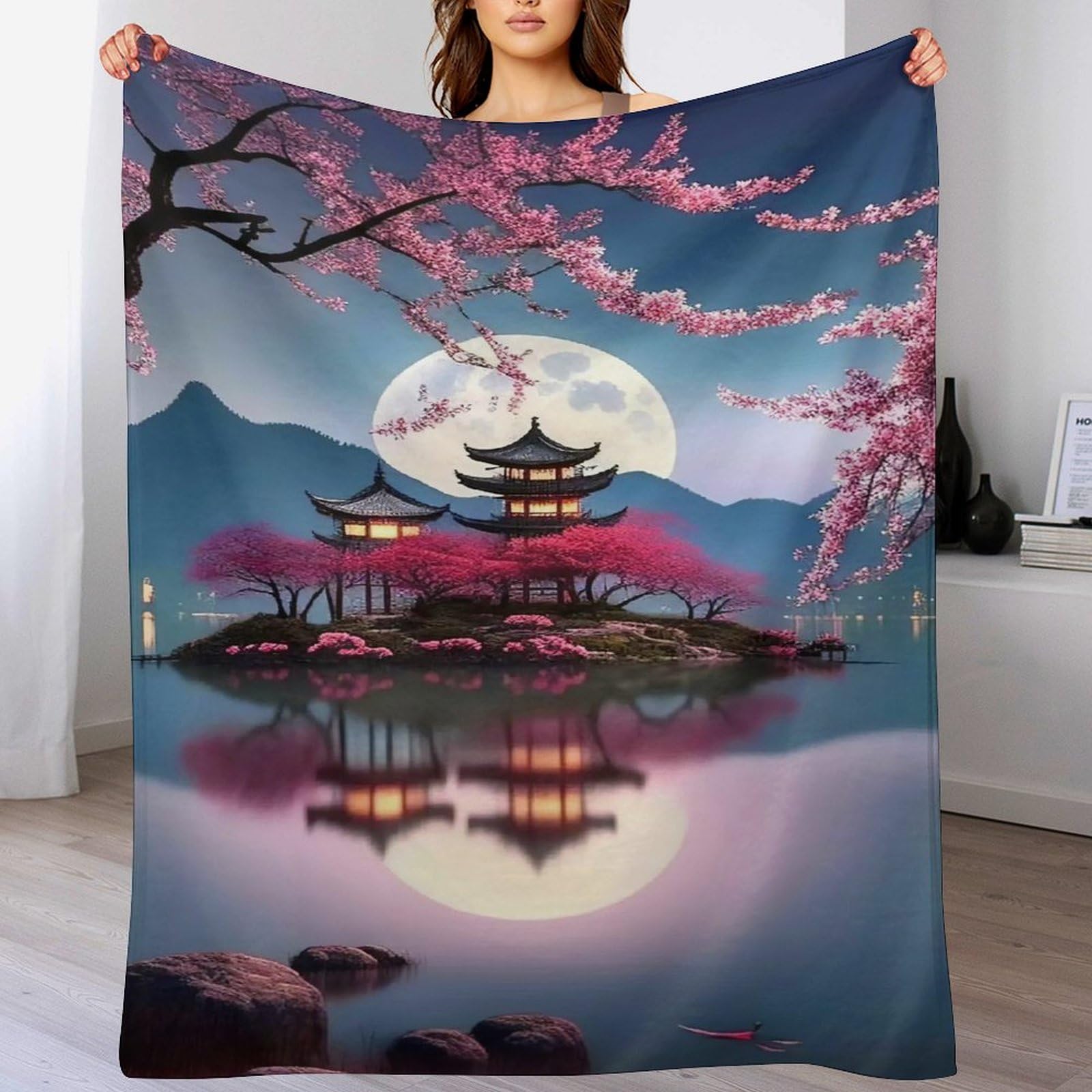 Couverture chaude en polaire pour soirées cocooning sur le canape ou en camping