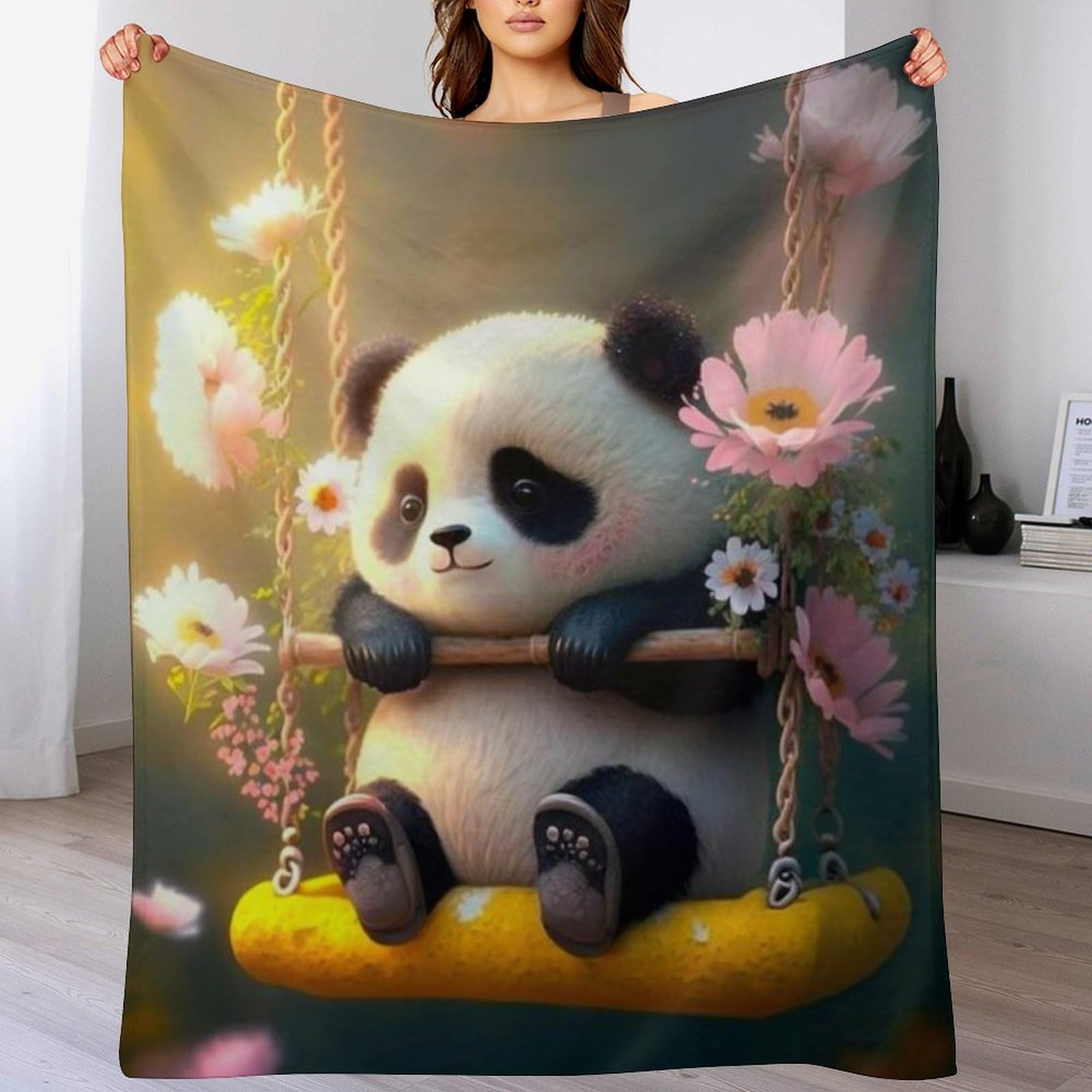 Couverture panda flannel pour vos soirées cocooning sur le canapé-lit