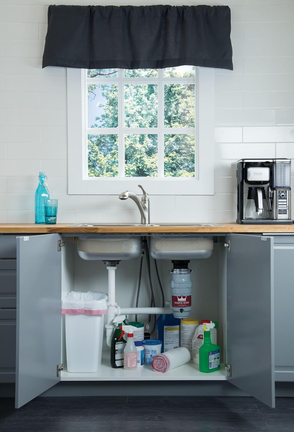 Waste King L-1001 installed under a kitchen sink