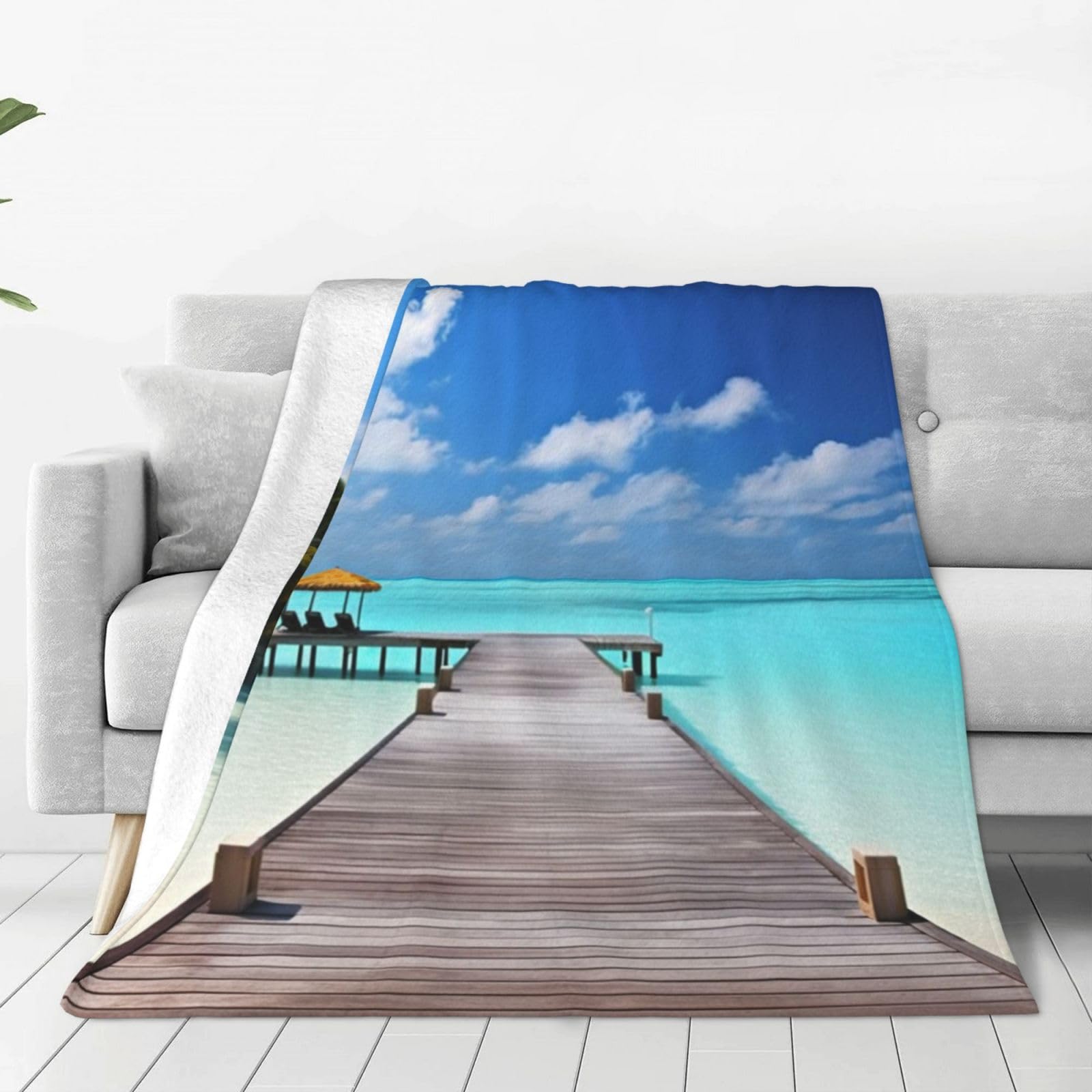 Couverture polaire legere Maldives contre le froid hivernal dans le salon