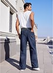 Jeans de jeans de sac en croûte Hip Hop à large jambe à l'écart des poches Denim Jean Pantalons Streetwear pour homme