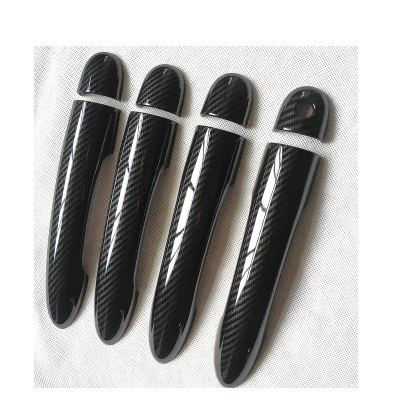 Poignées de porte Clio 3 look carbone pour sublimer votre voiture lors des trajets quotidiens