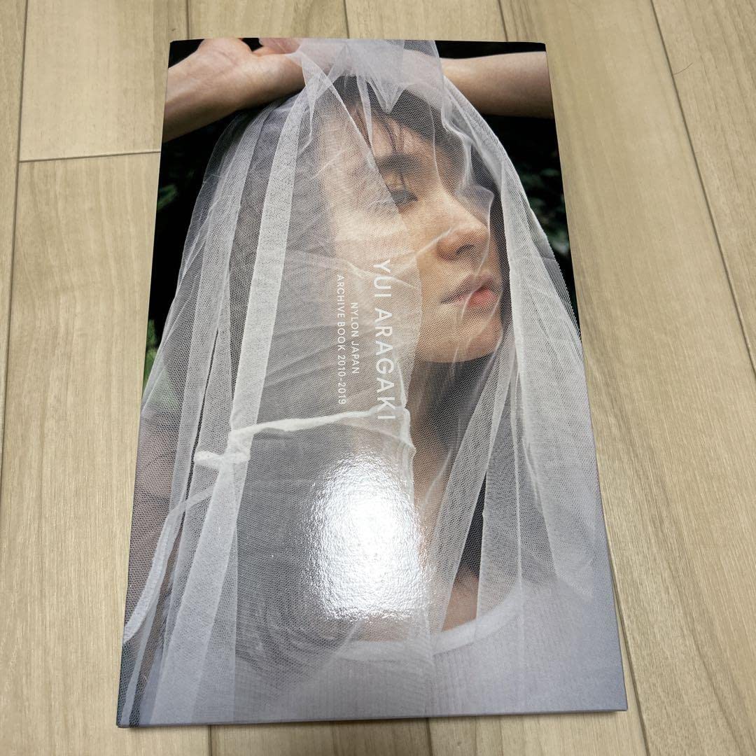 Amazon.co.jp: 新垣結衣 写真集 NYLON JAPAN ARCHIVE BOOK : おもちゃ