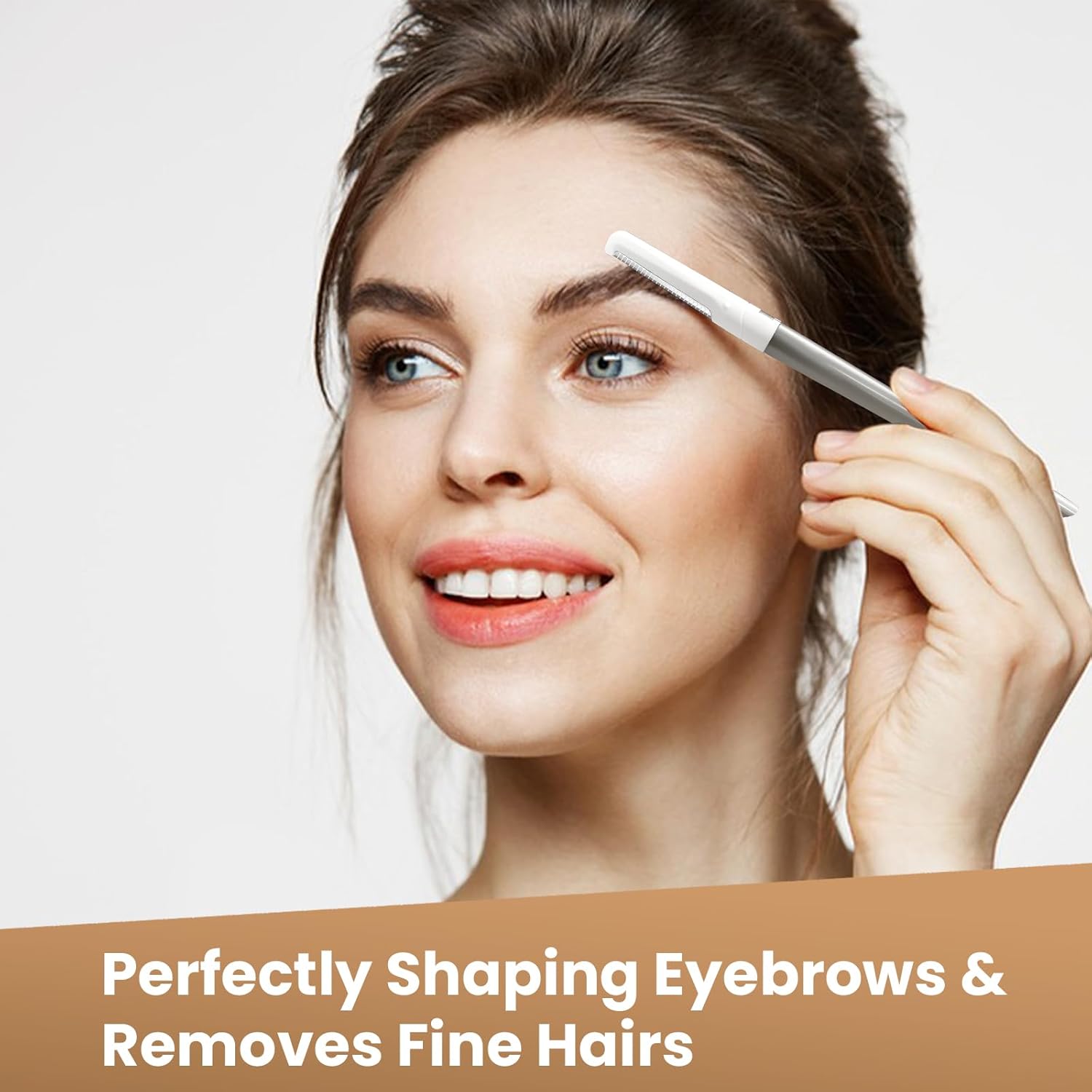 Woman using dermaplaning tool to shape eyebrows.