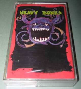 Heavy Bones [CASSETTE] by : Amazon.co.uk: CDs & Vinyl