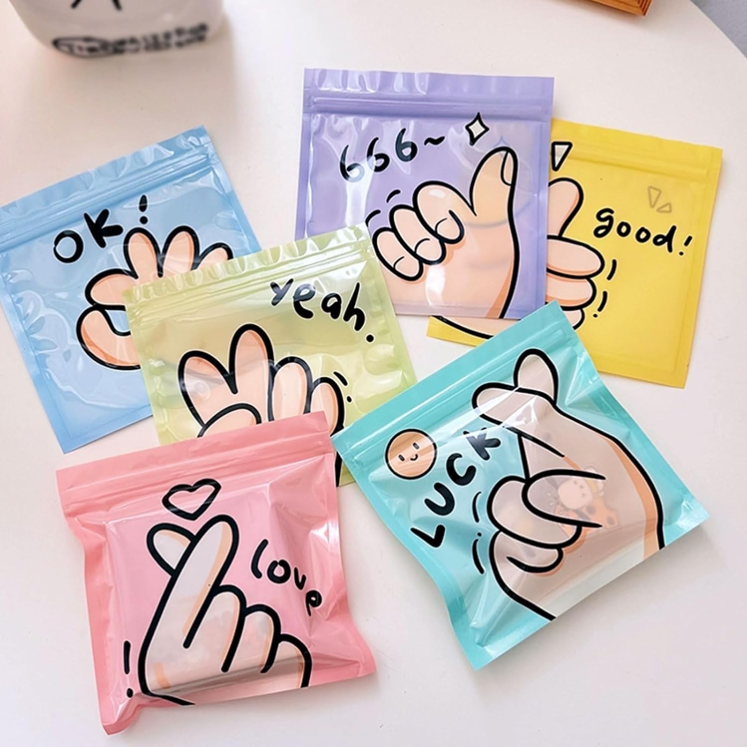 SATYAM KRAFT 36 Pcs Korean Style Ziplock Pouches for Gifting, Birthday Return Gift Packing, Christmas Gifts, Snacks, Dry Fruits, Small Items | PVC Bags with Hand Sign Prints – Multicolor (Random)