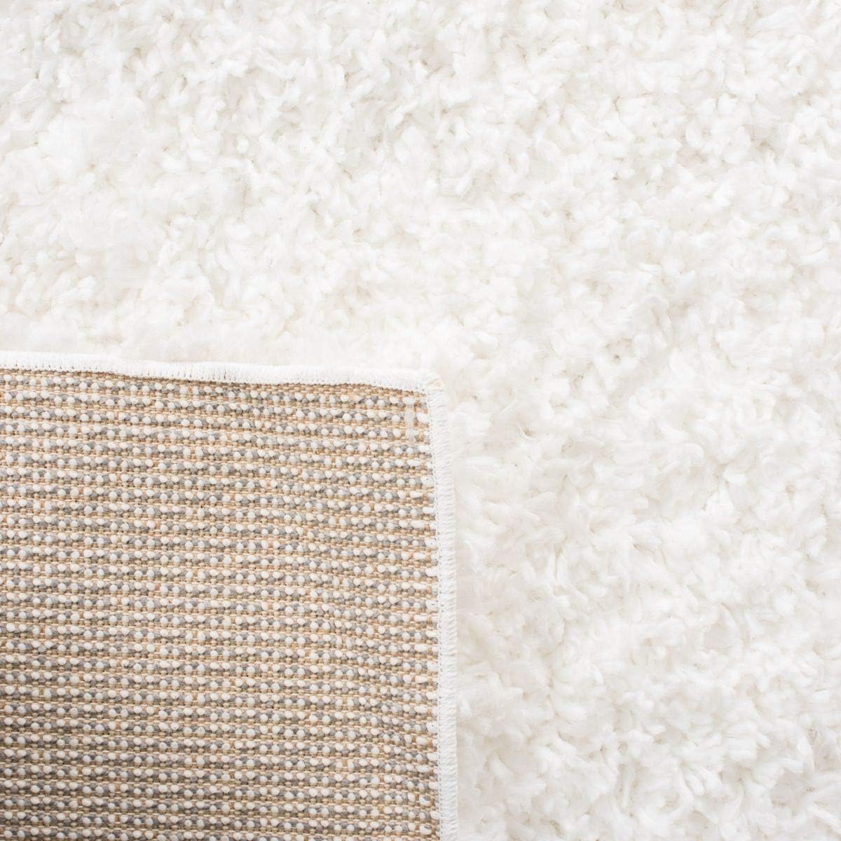 August Shag White Synthetic Area Rug 2' x 5'