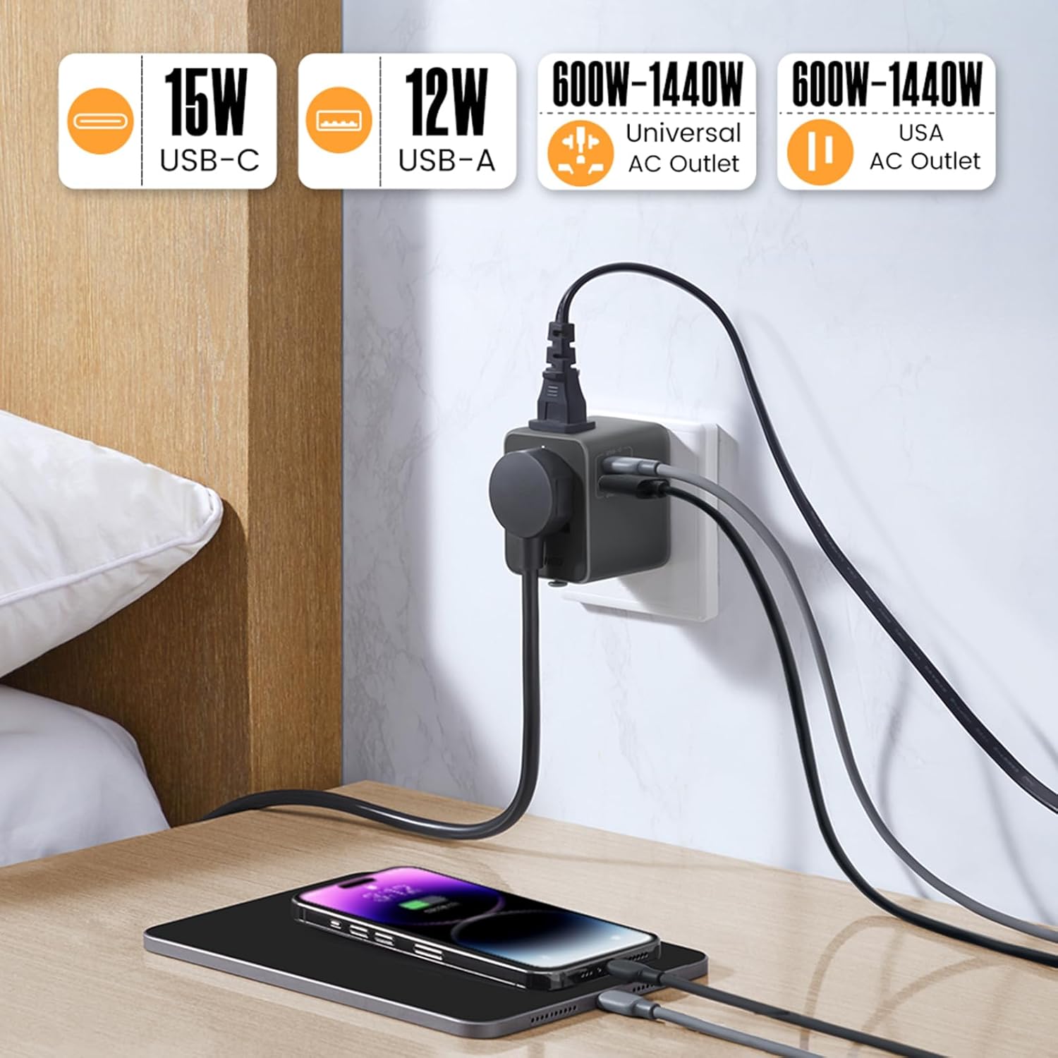 Adapter plugged into wall charging multiple devices