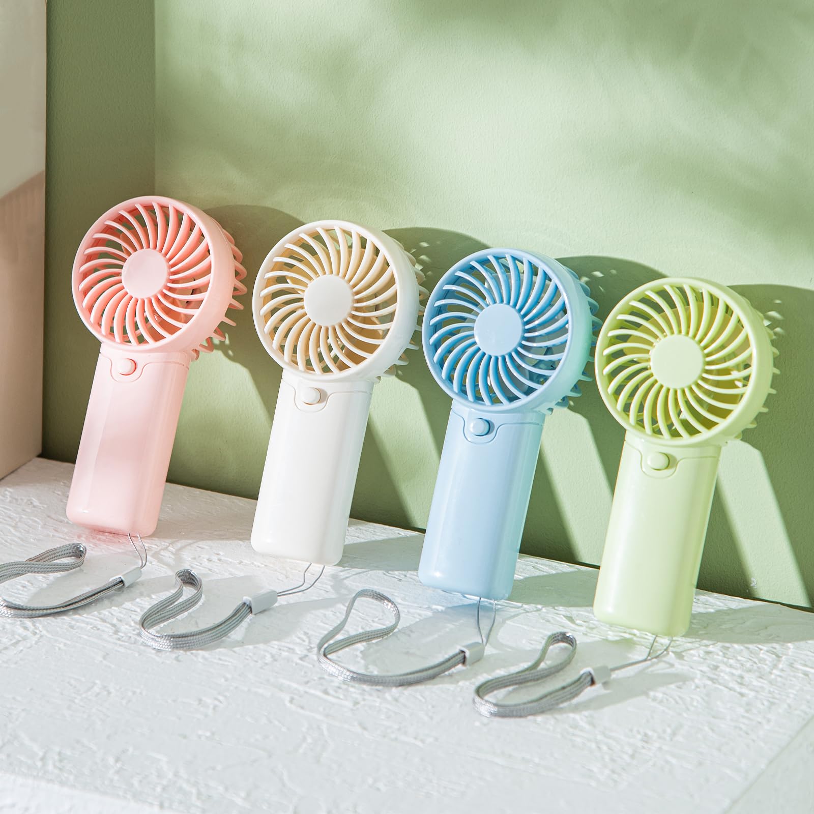 Lot de 12 mini ventilateurs portables – Fonctionne avec piles AAA de 12,7 cm, léger à main avec 1 vitesse et cordon – Ventilateur personnel silencieux pour enfants, filles, femmes et hommes – Idéal