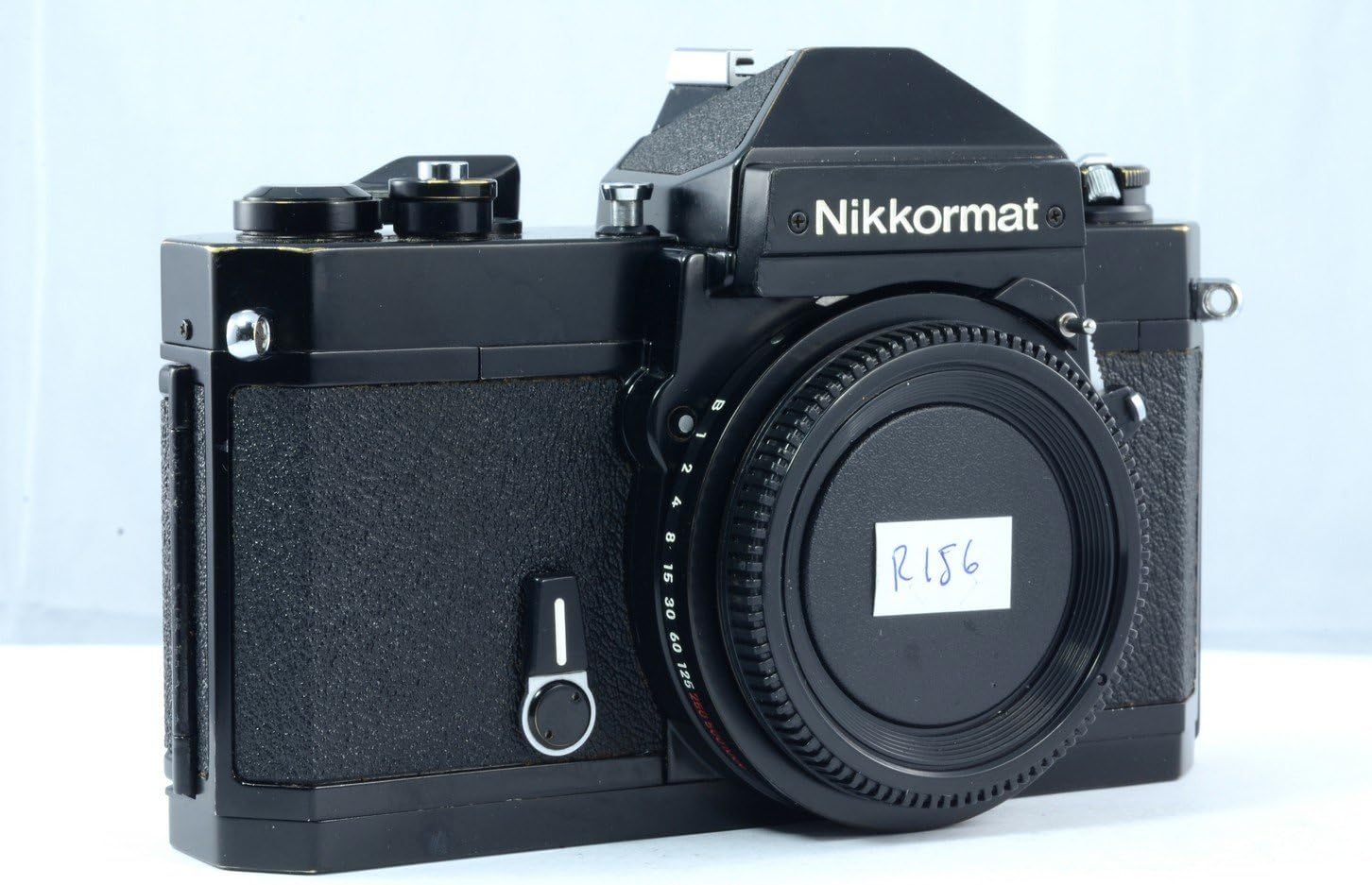 Front view of Nikon Nikkormat FT2 camera with lens attached