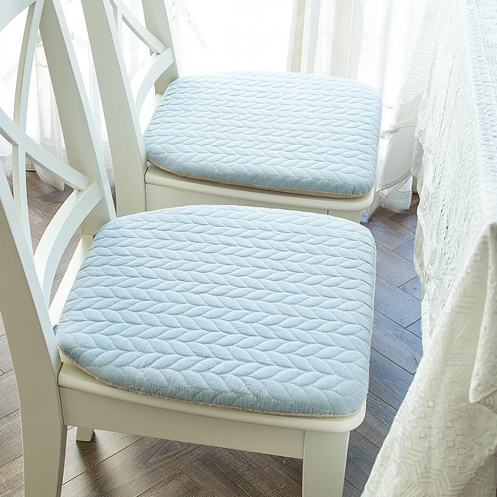 Coussins de chaise avec attaches pour stopper l'inconfort à table