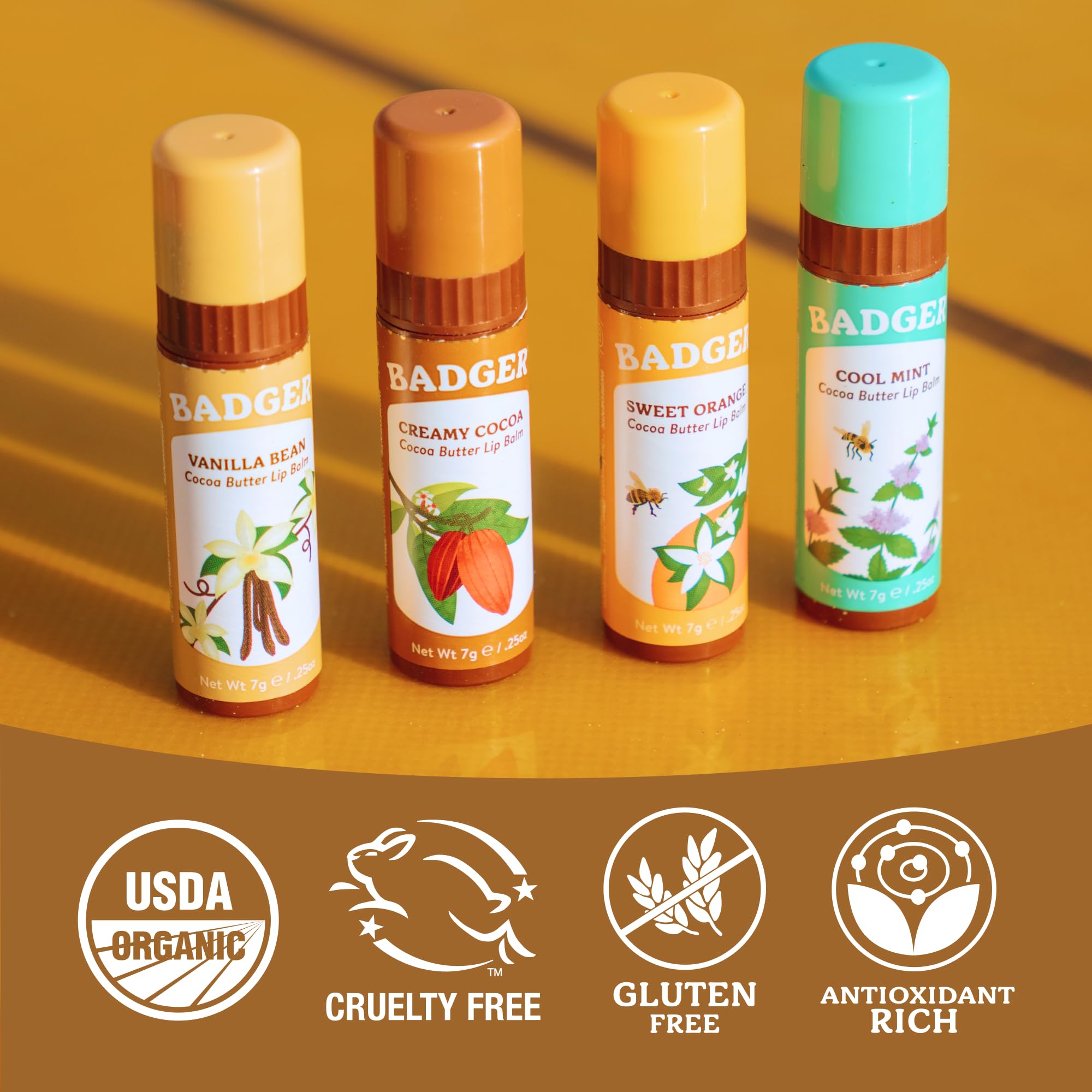 Badger Cocoa Butter Lip Balm Set, 100% Organic, Long Lasting Lip Moisturizers, Lip Care Variety Pack (Cocoa, Orange, Mint & Vanilla), All Natural Lip Balms, 4-pack