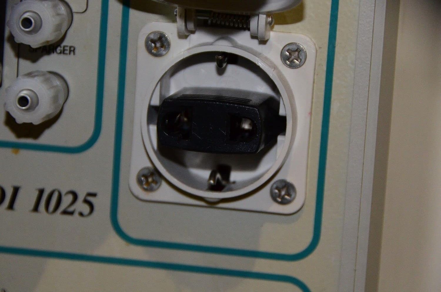 Close-up of the front panel power outlet