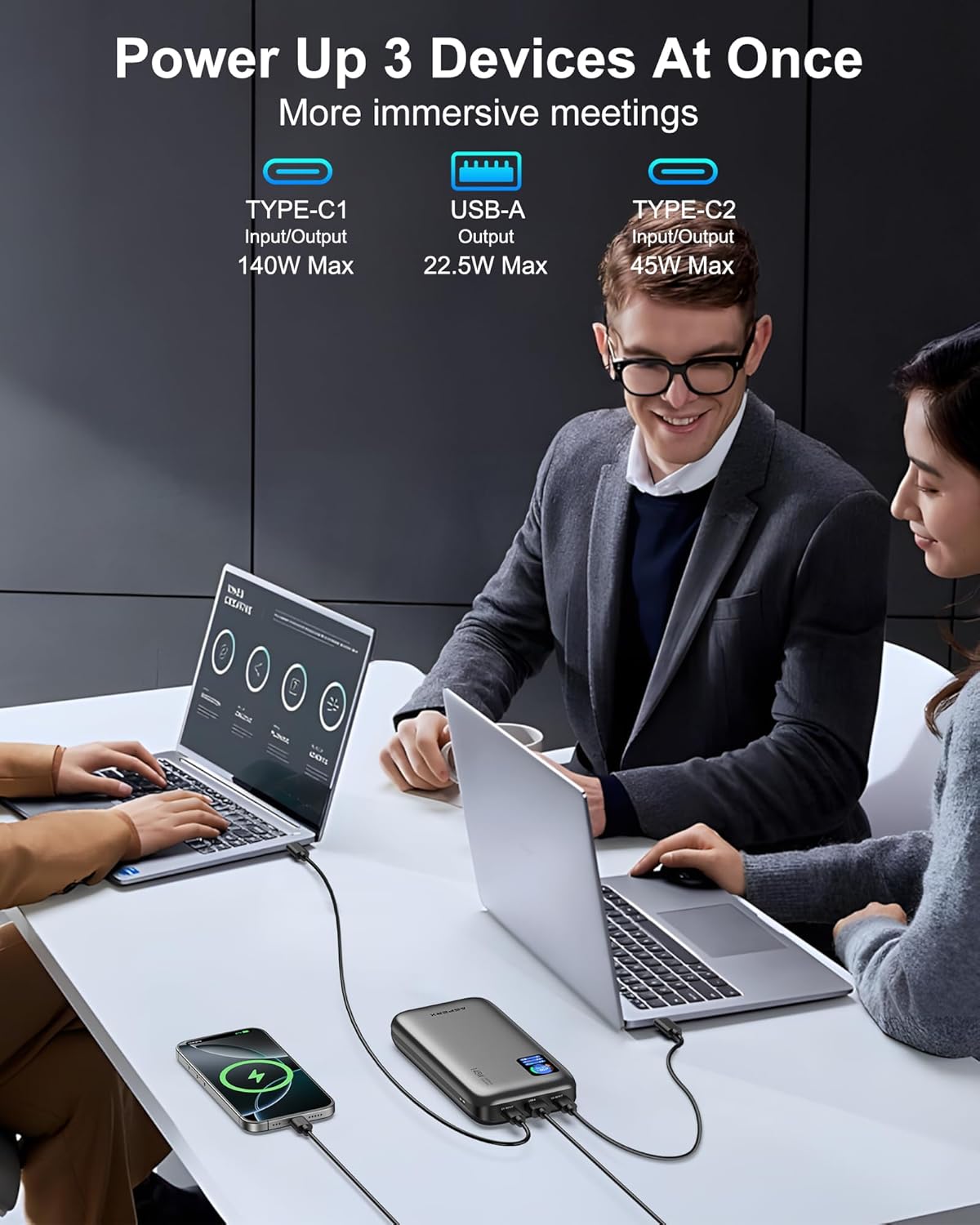AsperX Power Bank charging a laptop, a smartphone, and another device simultaneously.