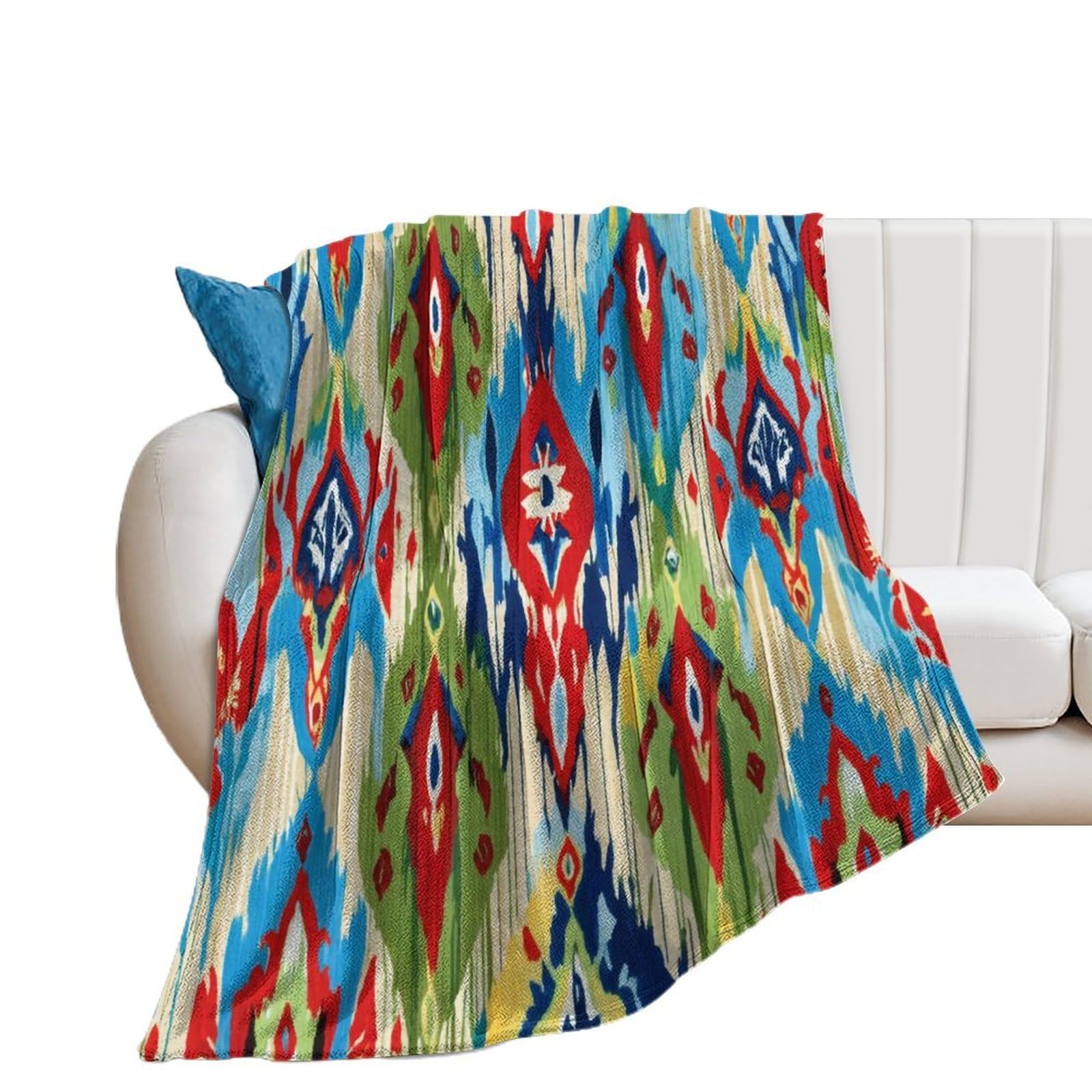 Jeté de canapé Ikat vert et bleu en flanelle pour vos soirées cocooning et lecture