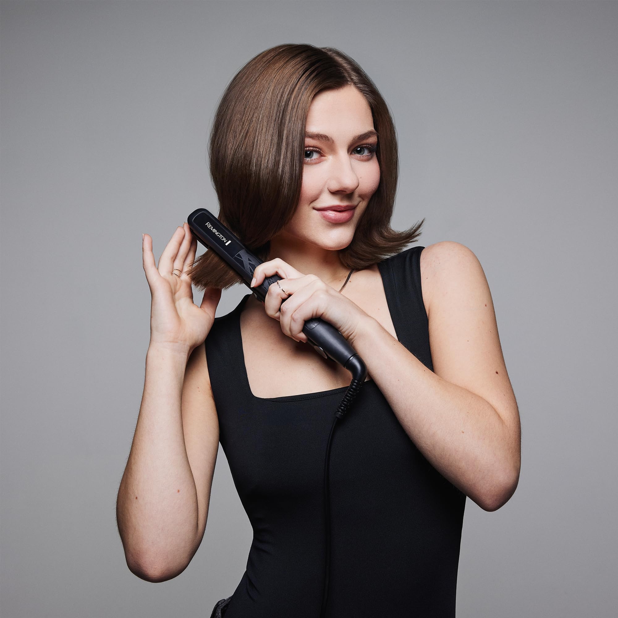 Remington Piastra per capelli Ceramic Straight - 4 Protezioni - Rivestimento antistatico in tormalina ceramica, Distribuzione uniforme del calore, Carica statica inferiore e Lucentezza setosa, S3500