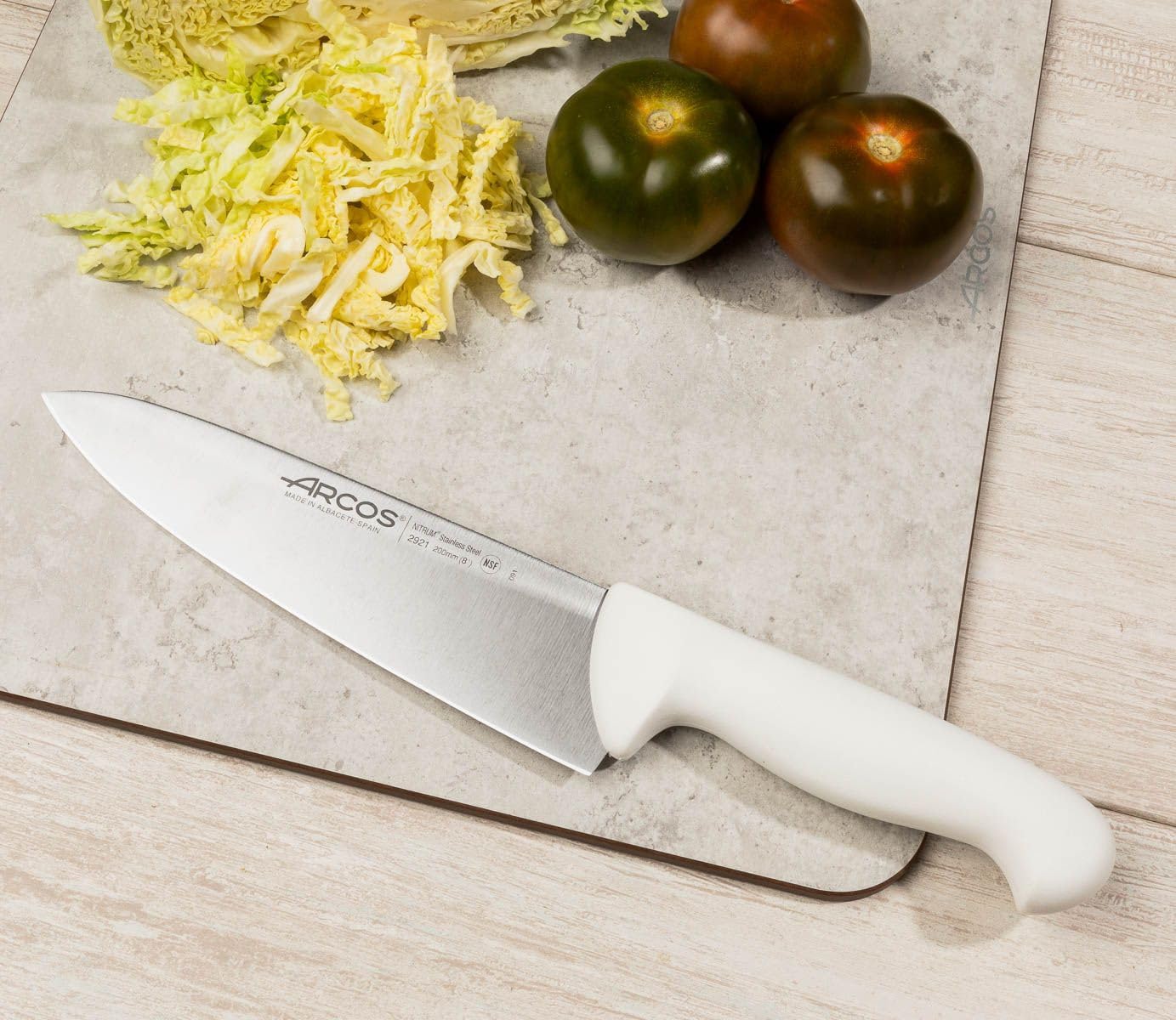 Arcos Chef Knife 8 Inch Nitrum Stainless Steel and 200 mm blade. Professional Multipurpose Cooking Knife. Ergonomic Polypropylene Handle. Series 2900. Color White