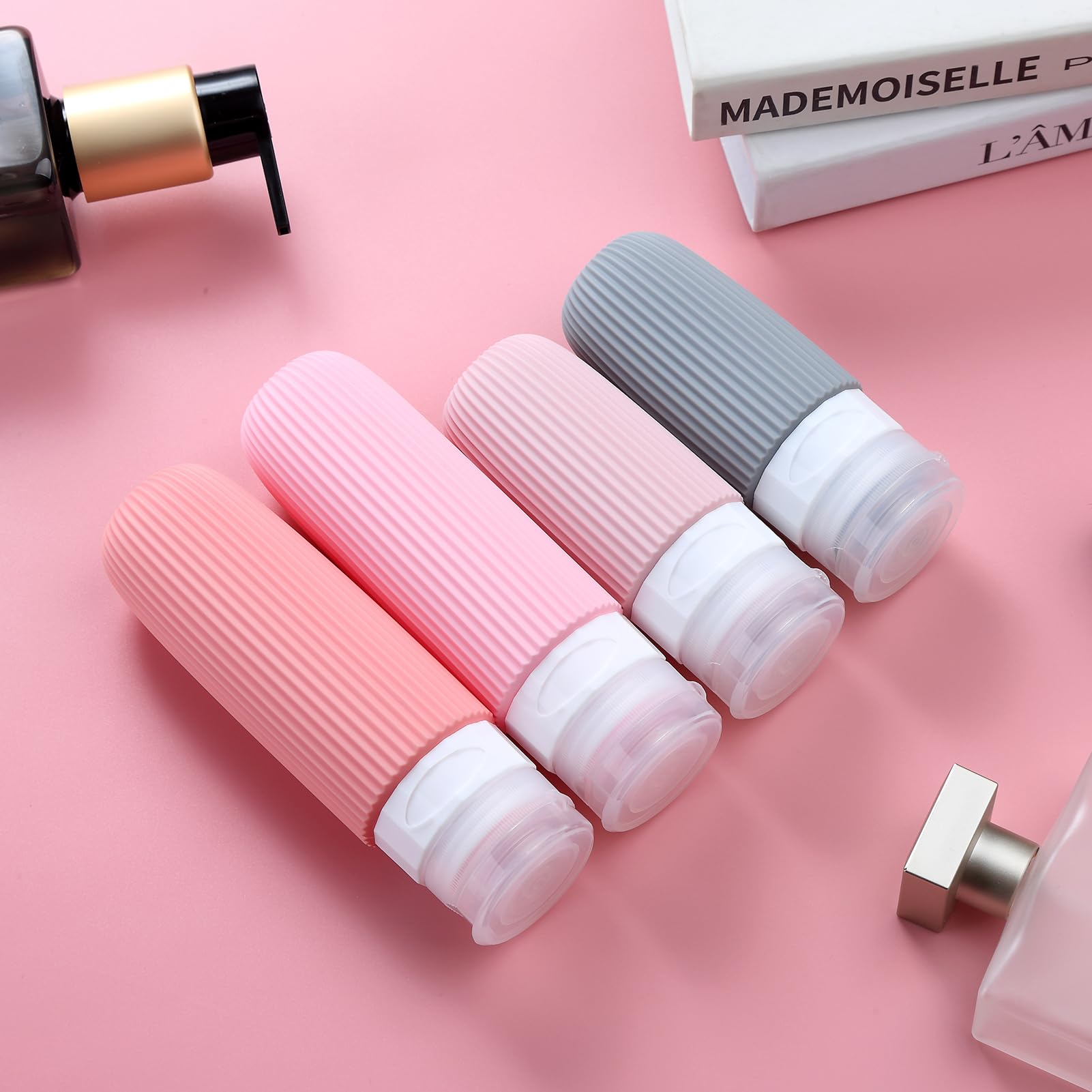 Mrsdry Set di 16 bottiglie da viaggio, approvate TSA, contenitori comprimibili in silicone a prova di perdite, per articoli da toeletta, accessori da viaggio ricaricabili per balsamo, shampoo, lozioni