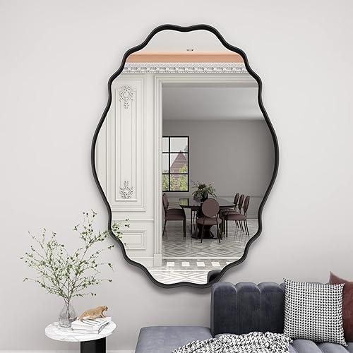 CHARMOR Espejo de pared irregular de 24 x 36 pulgadas, espejo de baño con marco ondulado ovalado negro mate, espejo de tocador negro moderno, espejo