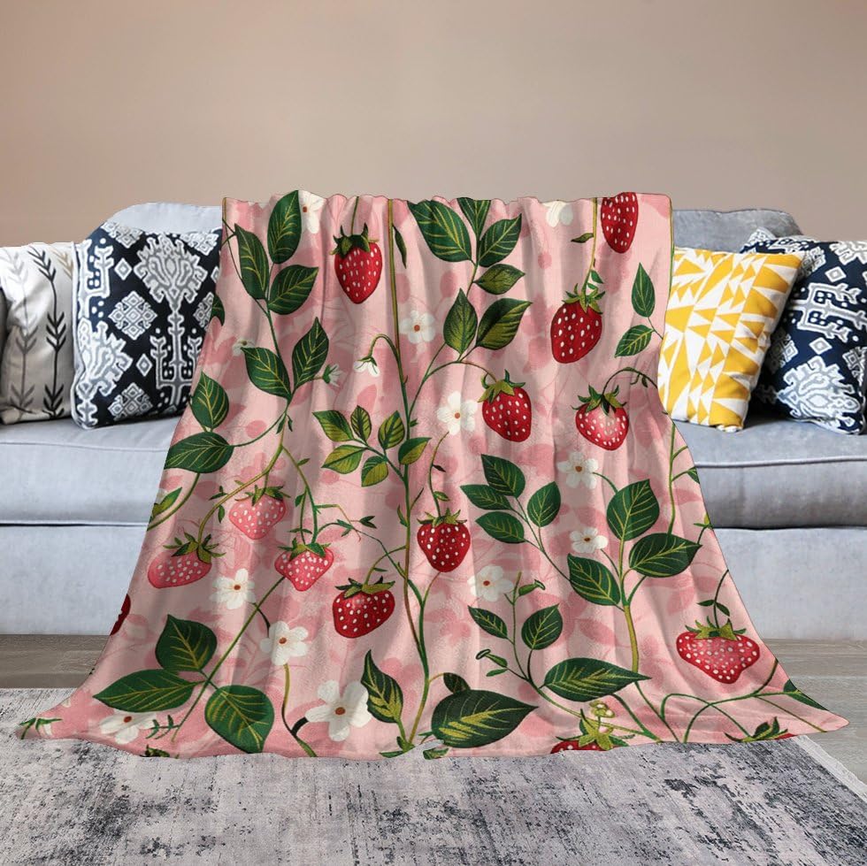 Couverture flanelle fraise pêche en micro polaire au toucher pelucheux