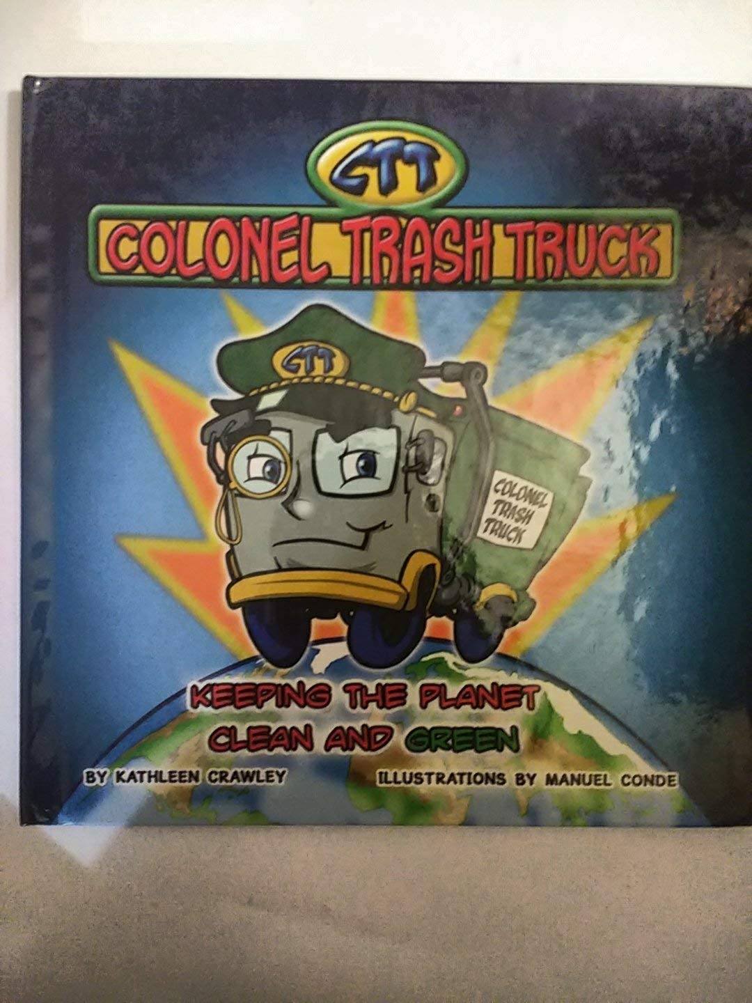 Colonel Trash Truck Hardcover – May 1, 2009