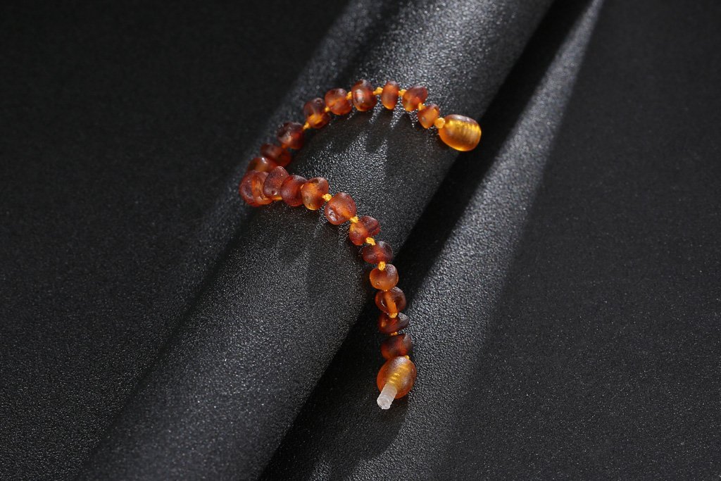 Baltic Amber Bracelet(Unisex)(Cognac Raw)(5.5 Inches) - Handmade Jewelry - Knotted Between Beads : Clothing, Shoes & Jewelry