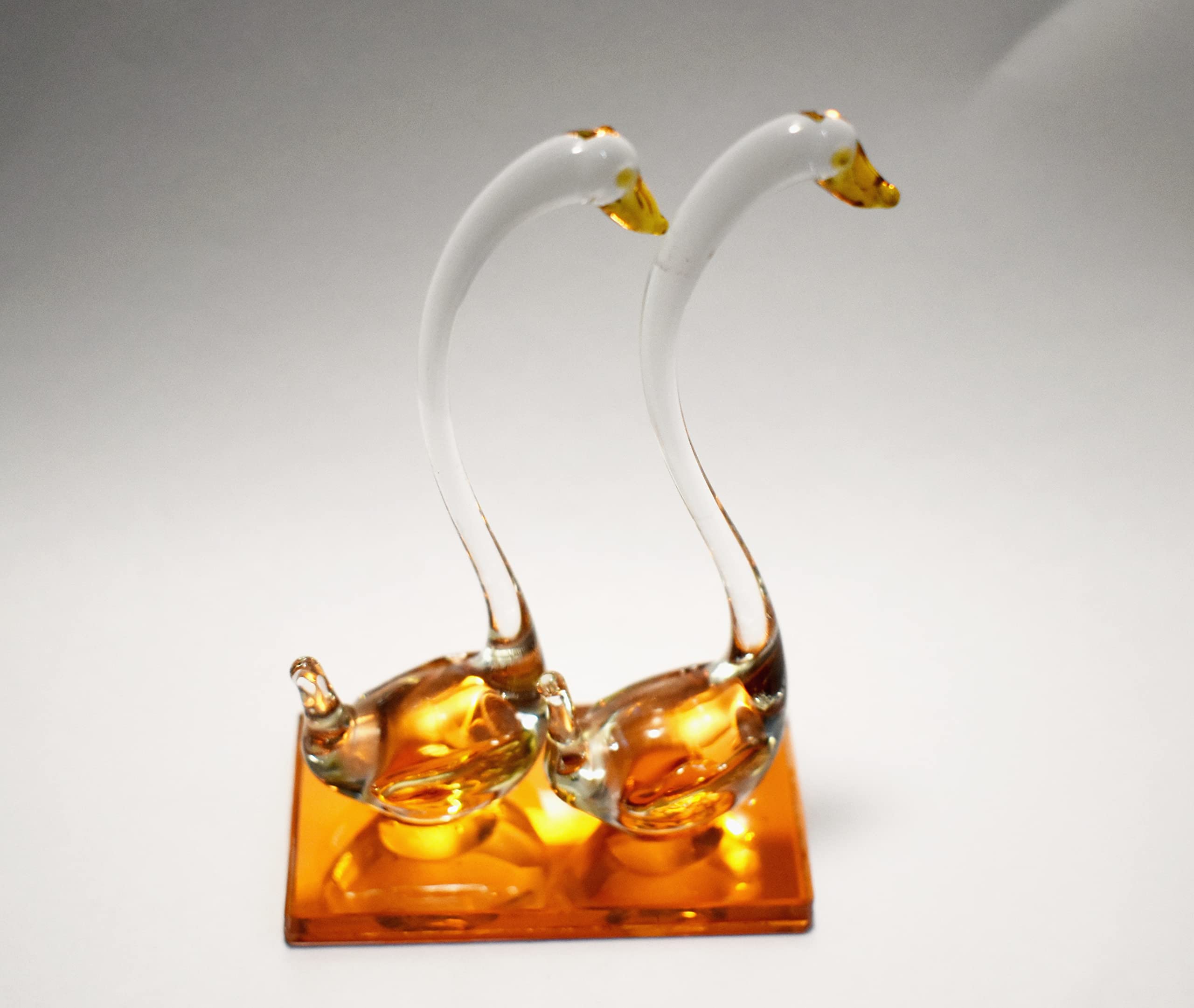MARBOGLASS India Crystal Glass Mini Swan Pair Colored Base Beautiful Showpiece (12 cm) (Orange)