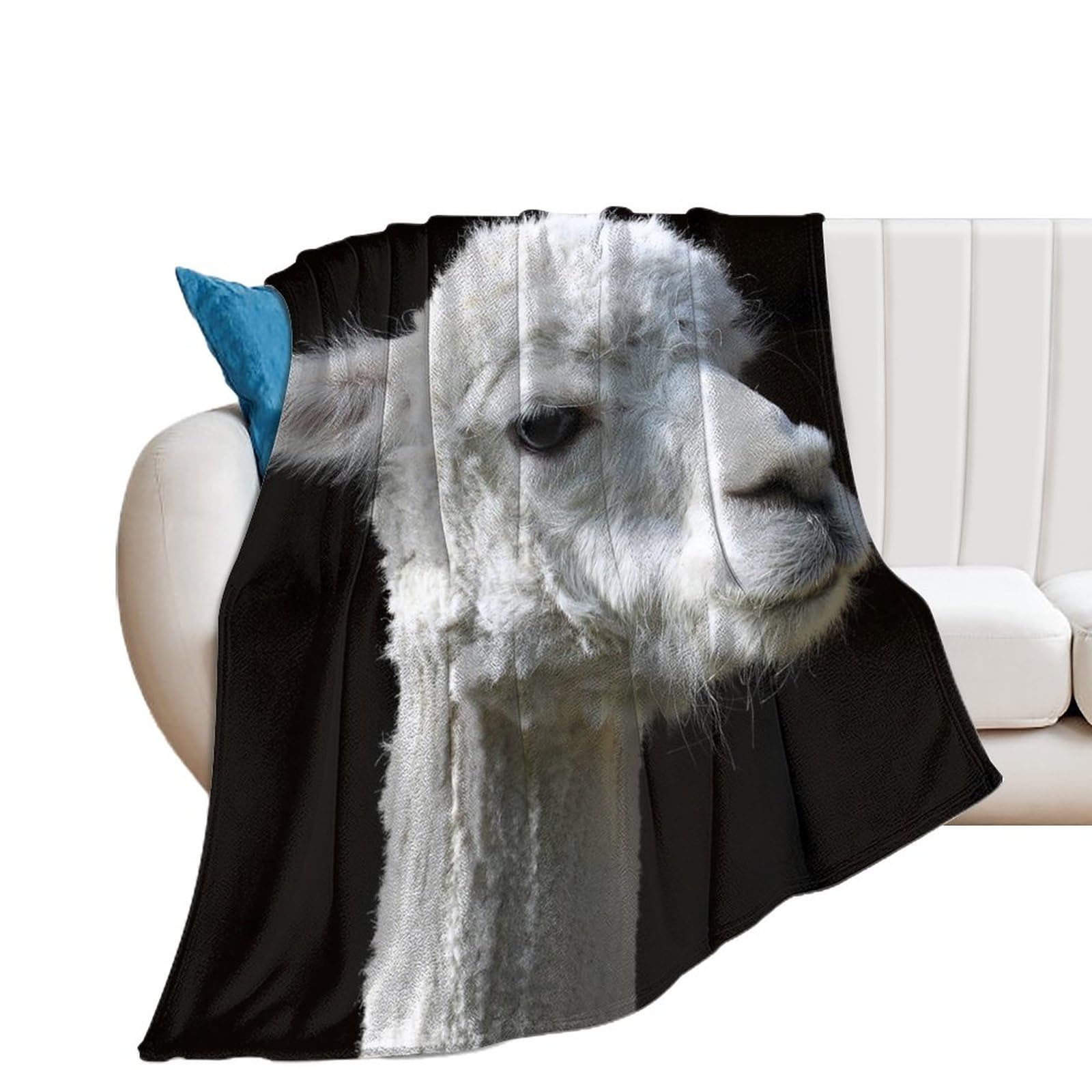 Couverture polaire alpaga blanc contre le froid hivernal sur votre canapé
