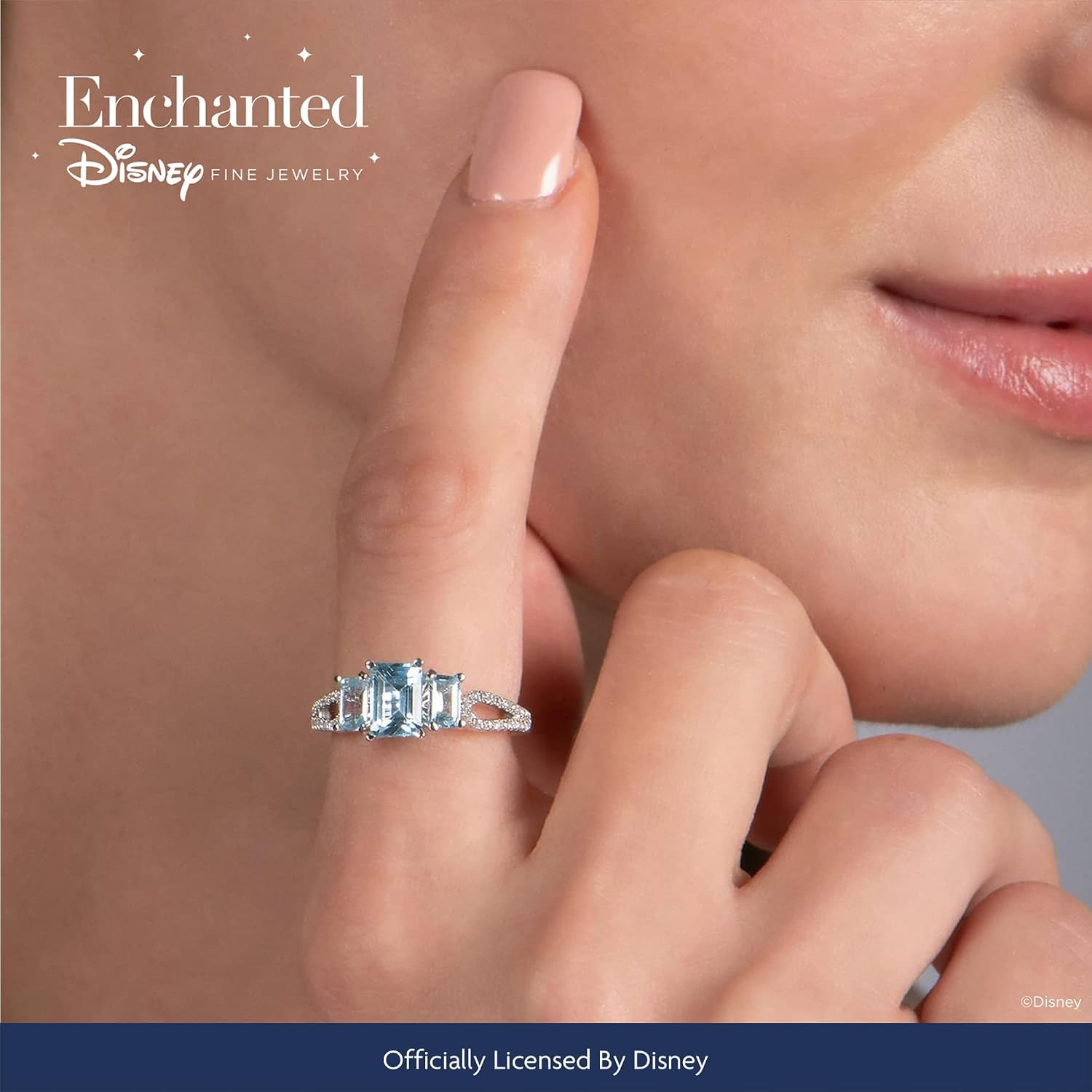 Jewelili Enchanted Disney Fine Jewelry Sterling Silver with 1/8 Cttw Diamond and Sky Blue Topaz Elsa Ring