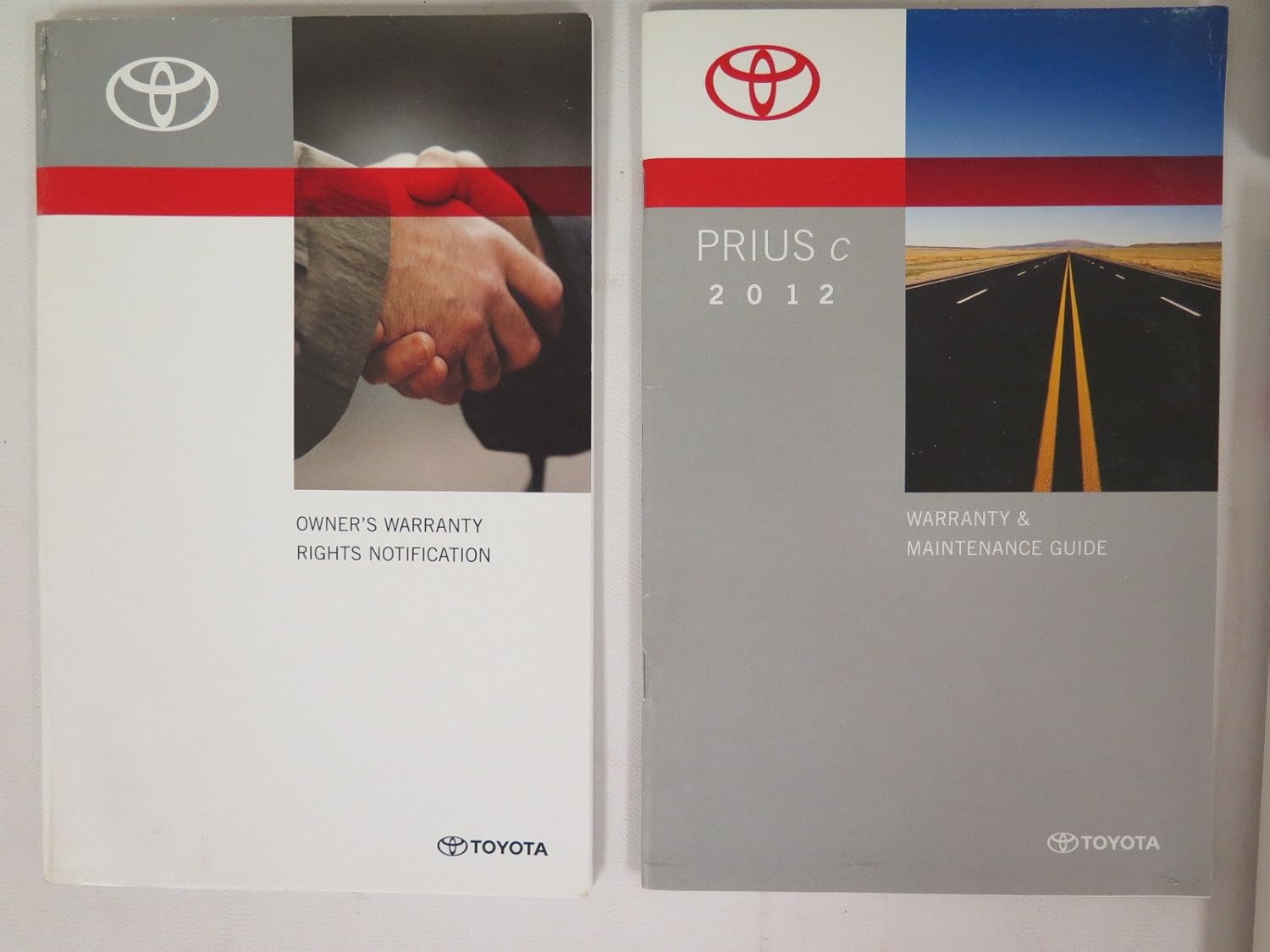 Covers of the Owner's Warranty Rights Notification and Warranty & Maintenance Guide for Toyota Prius C