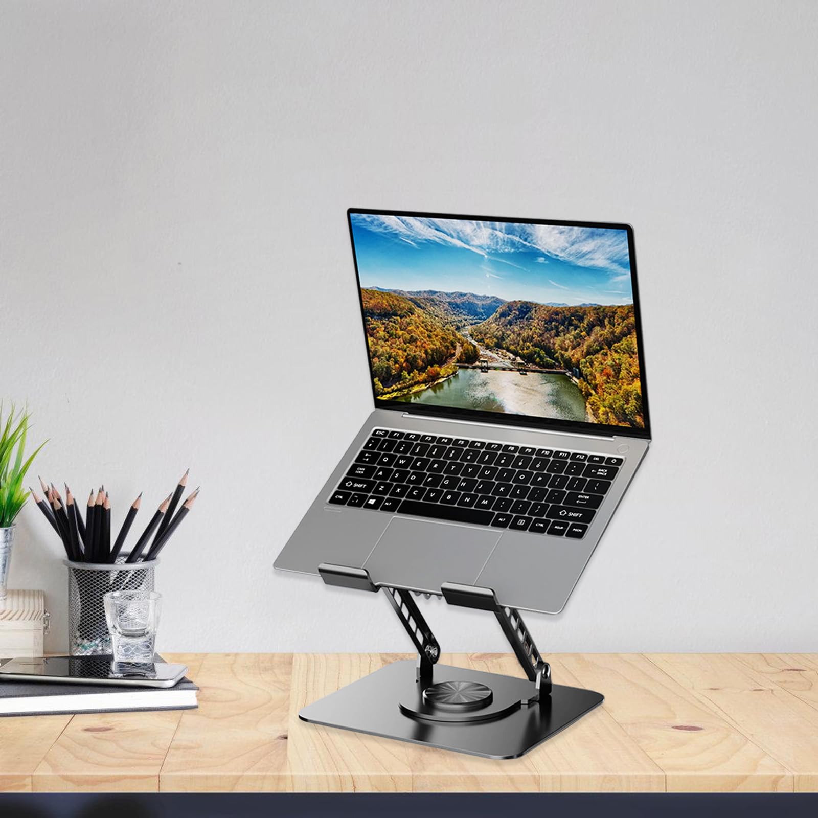 Soporte ergonómico para portátil con diseño giratorio de 360 grados y altura de ajuste para un trabajo óptimo. Soporte de refrigeración para portátil