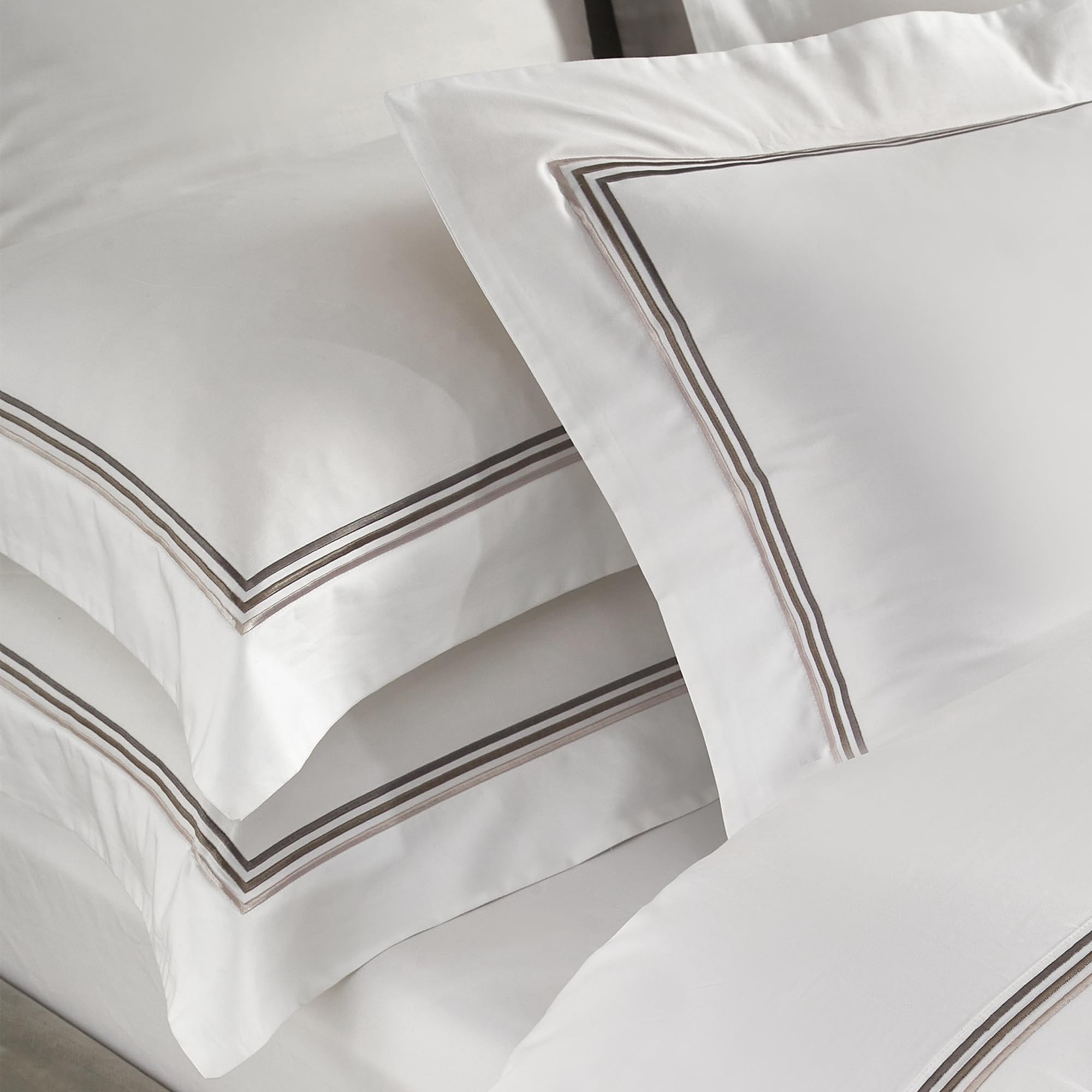 RANZNAZ white cotton sateen pillow shams with embroidered stripe border